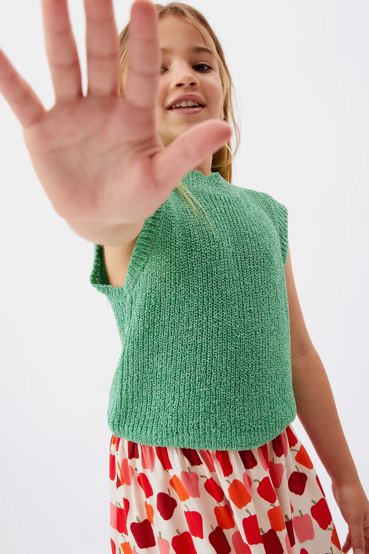 Girl's green sleeveless top