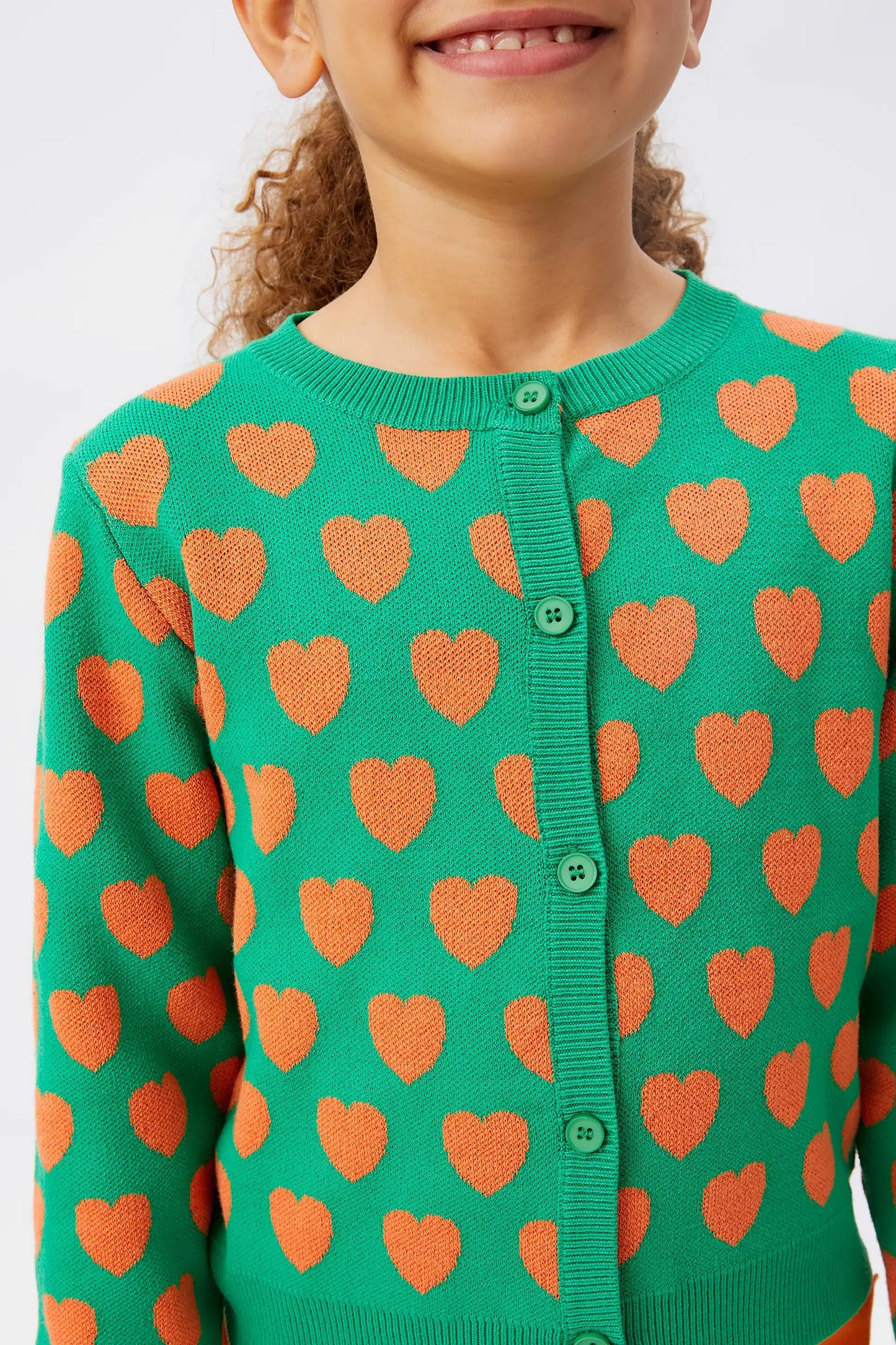 Girl's green hearts cardigan