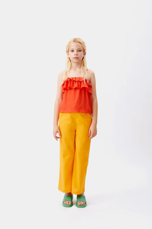 Girl's orange strapless top