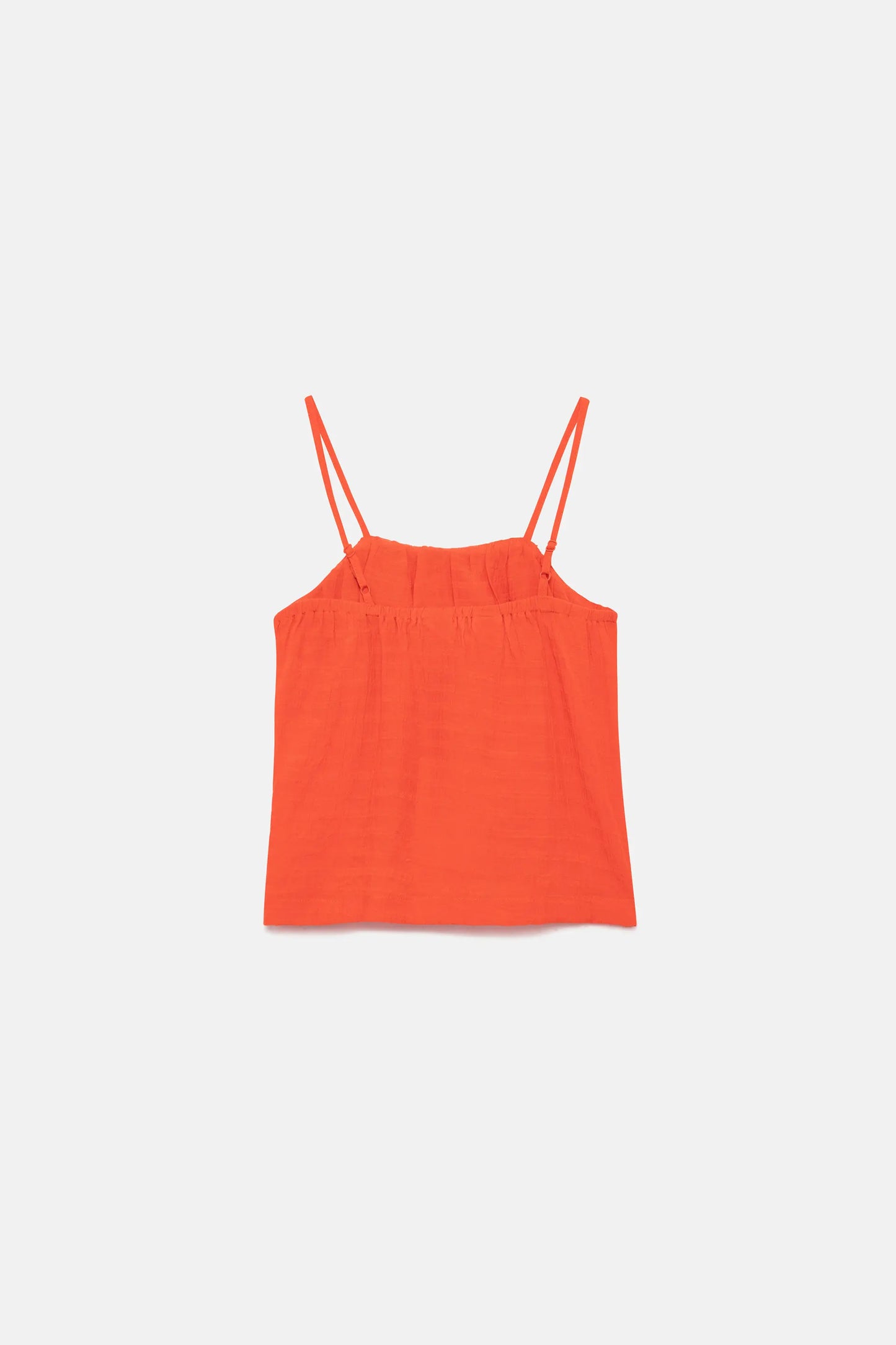 Girl's orange strapless top