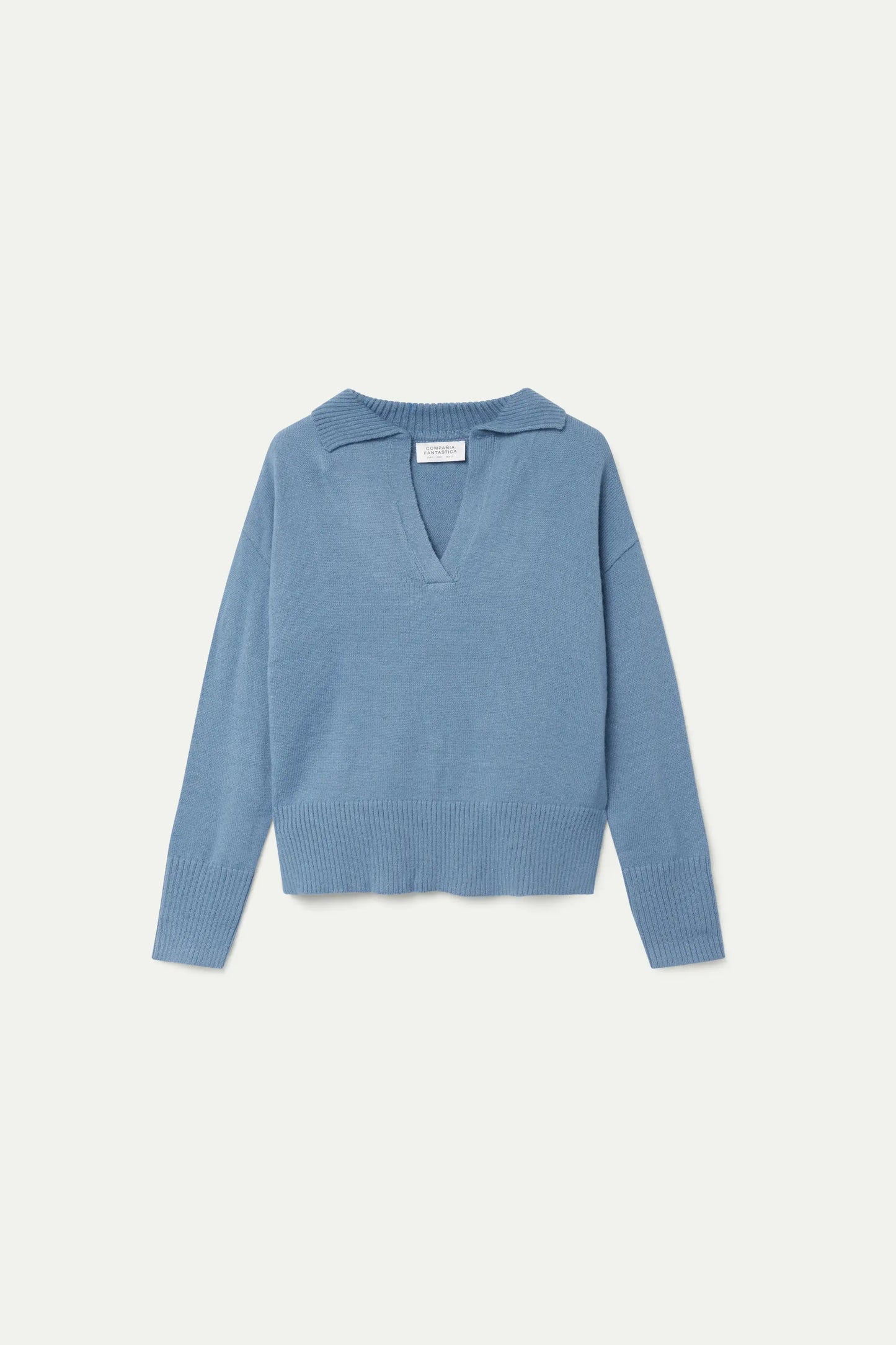 Blue polo neck sweater