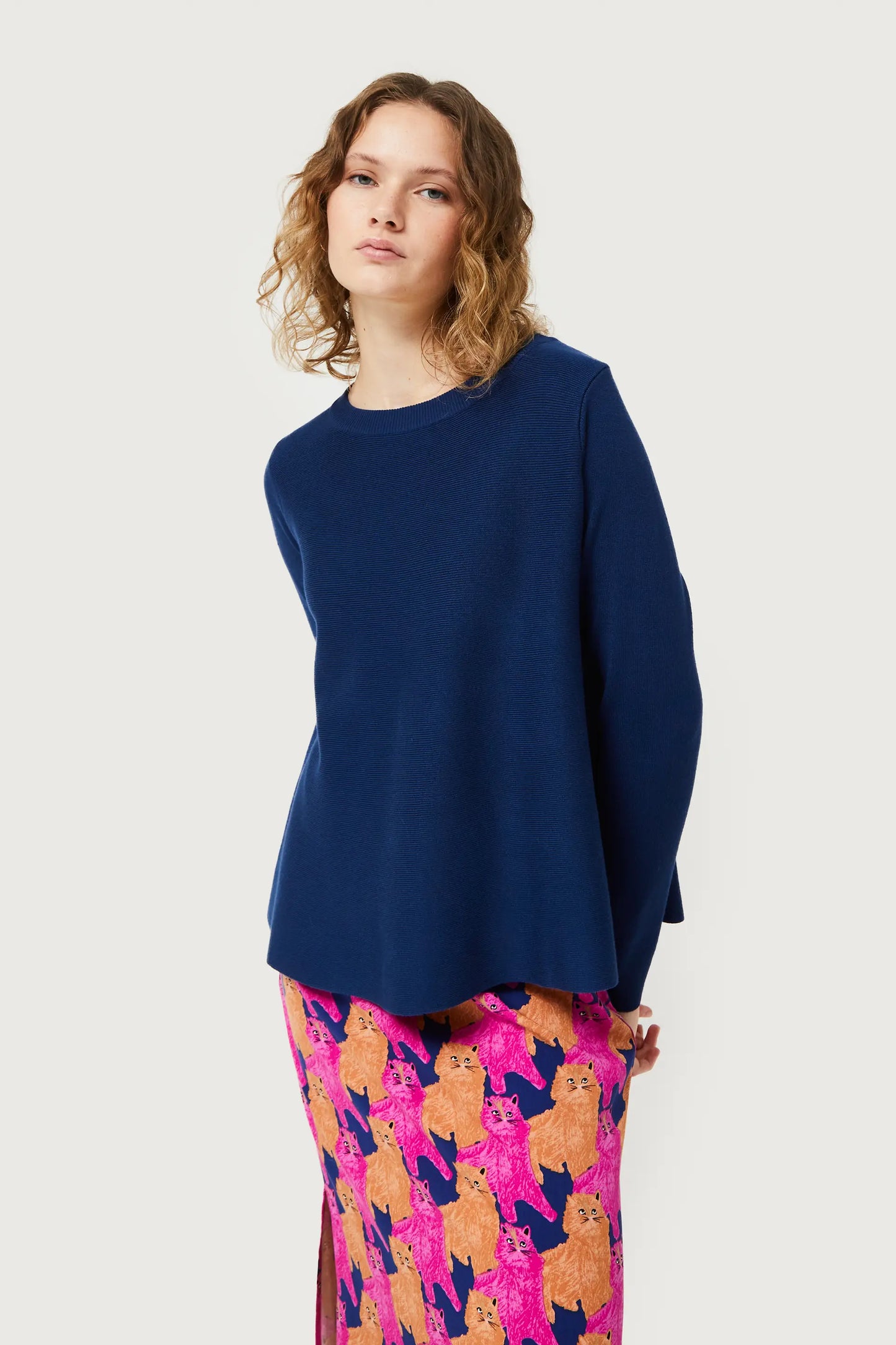 Navy blue flared knit sweater