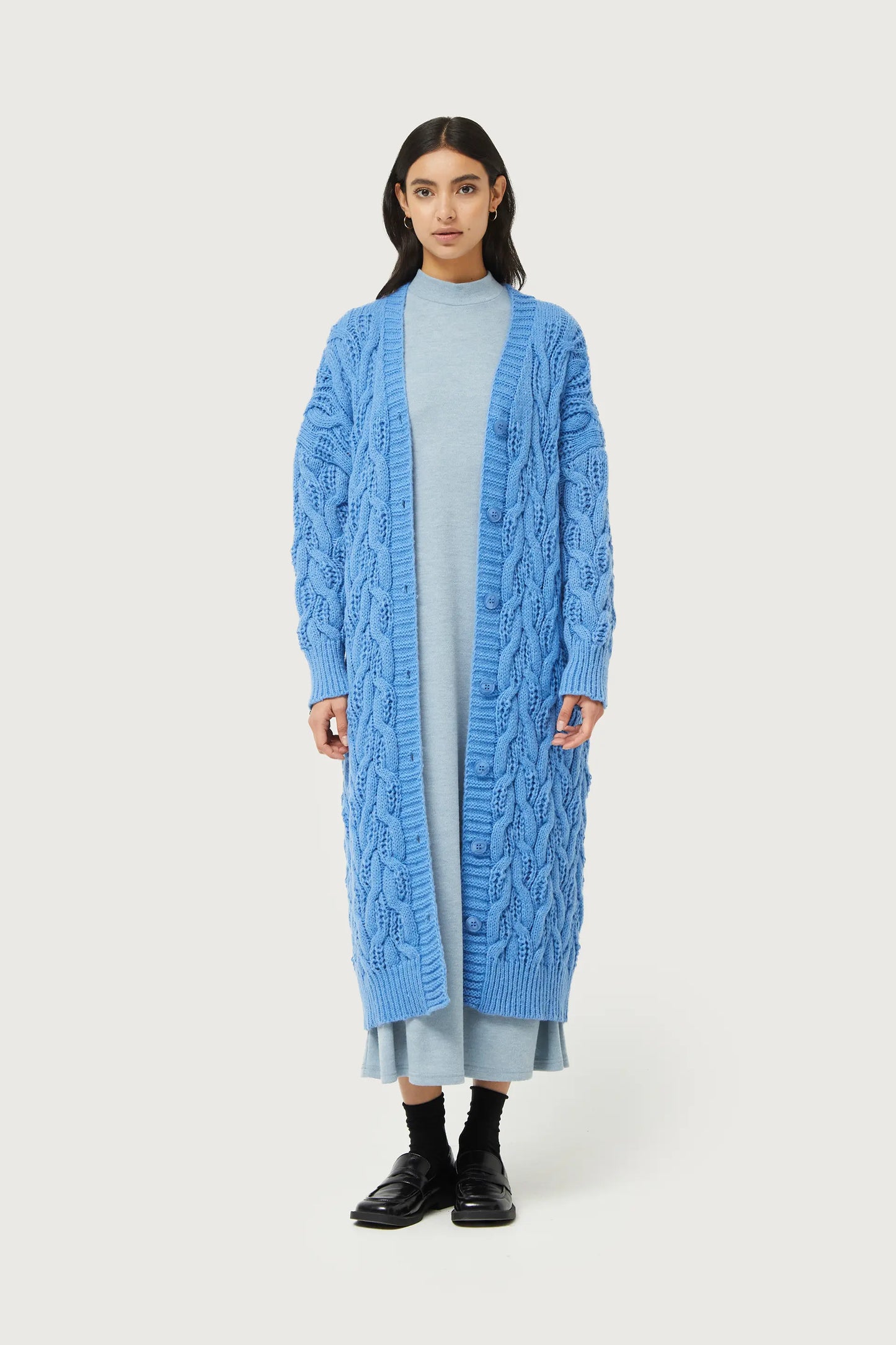 Long blue cable knit cardigan