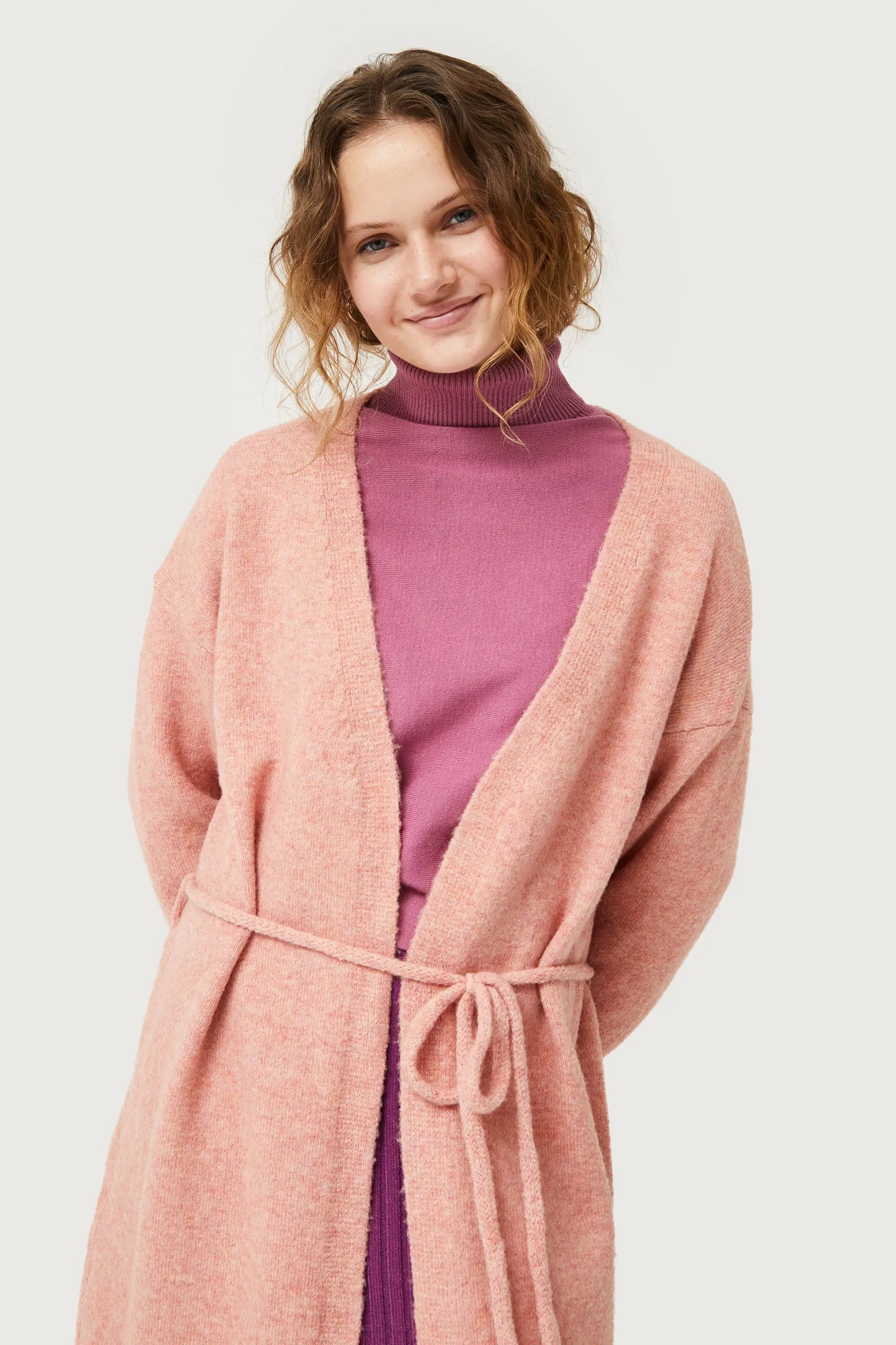 Chaqueta midi de punto rosa