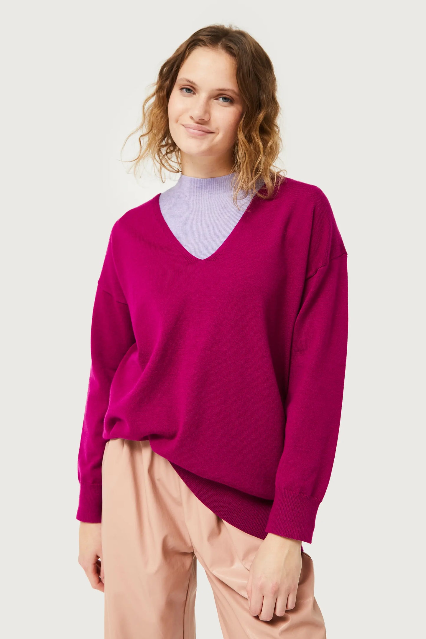 Jersey de punto con cuello pico fucsia