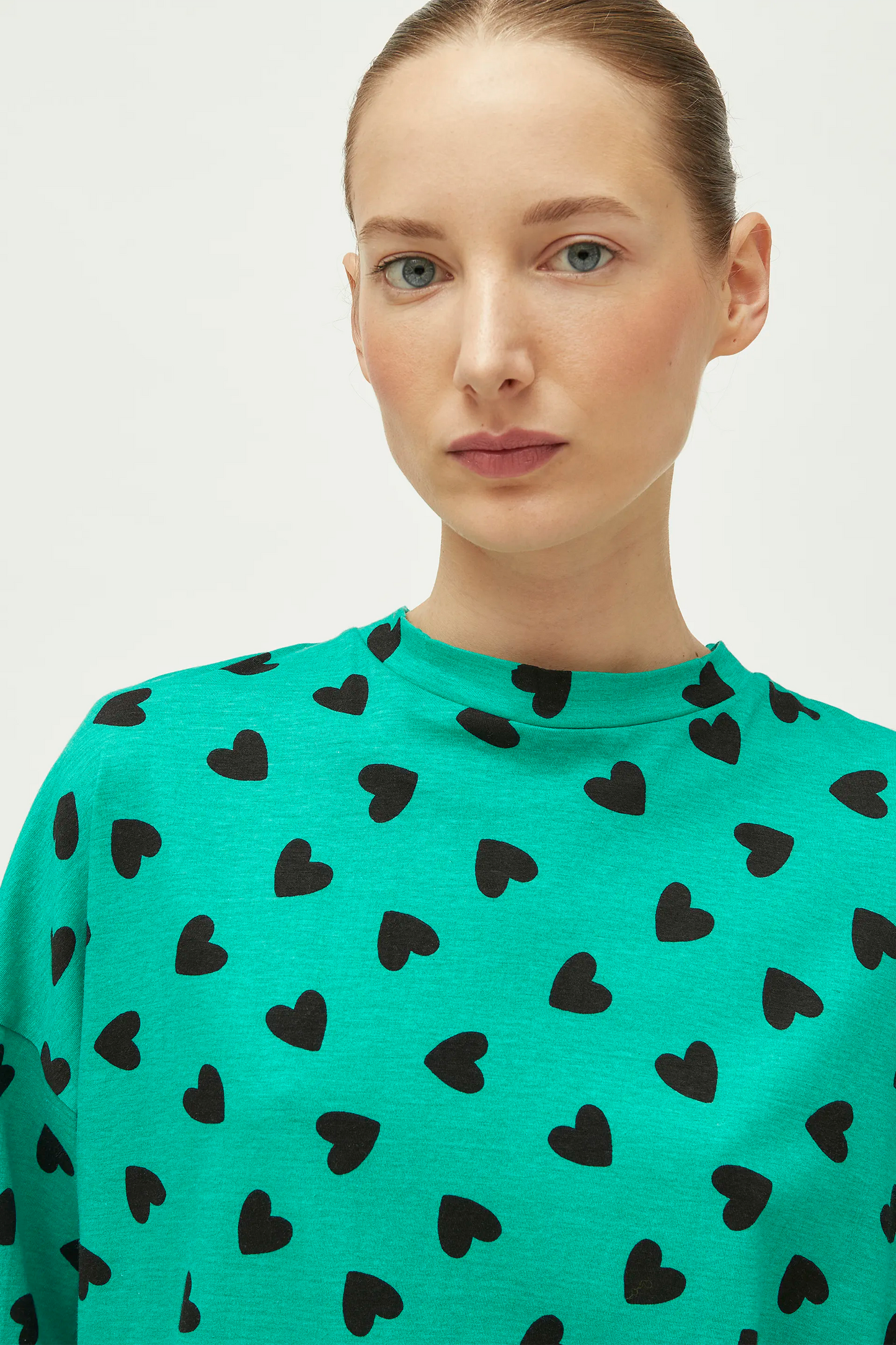 T-shirt con stampa cuore verde