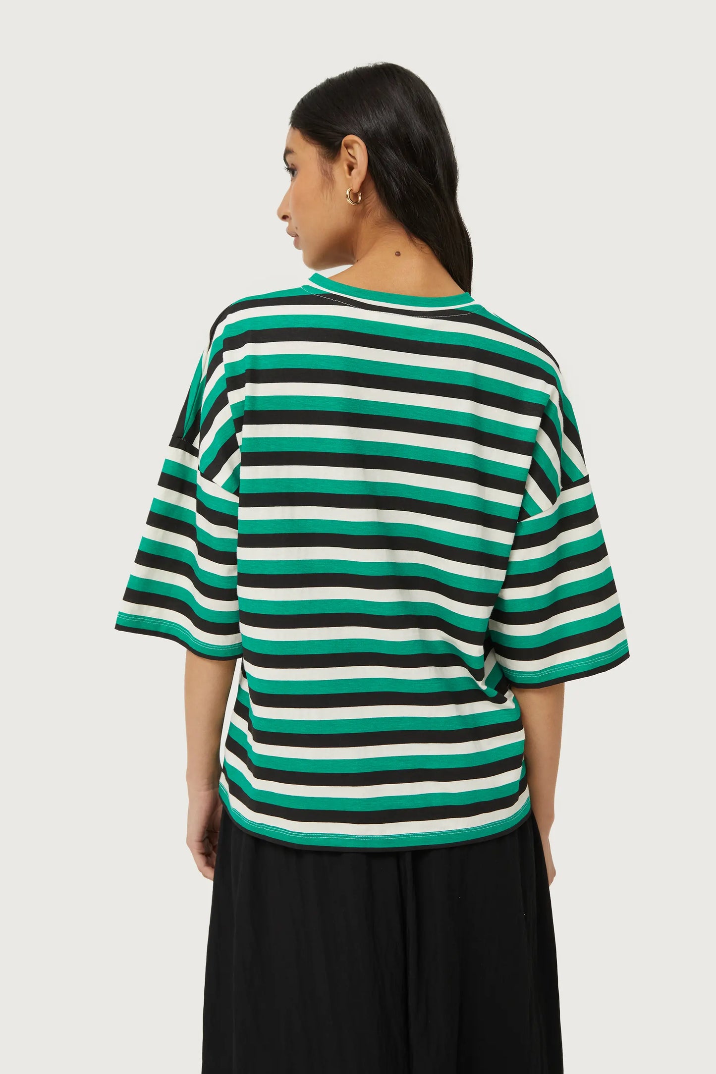 Striped T-shirt with green heart patch