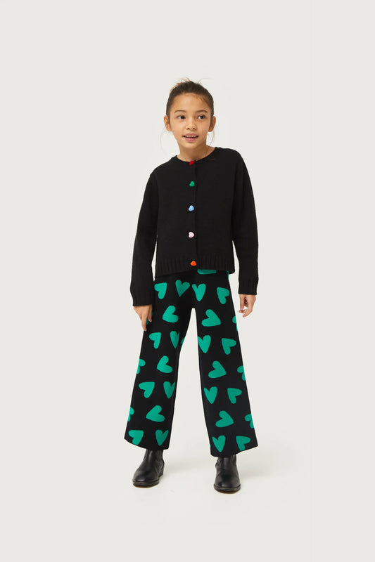 Pantalón de niña punto estampado de corazones negro