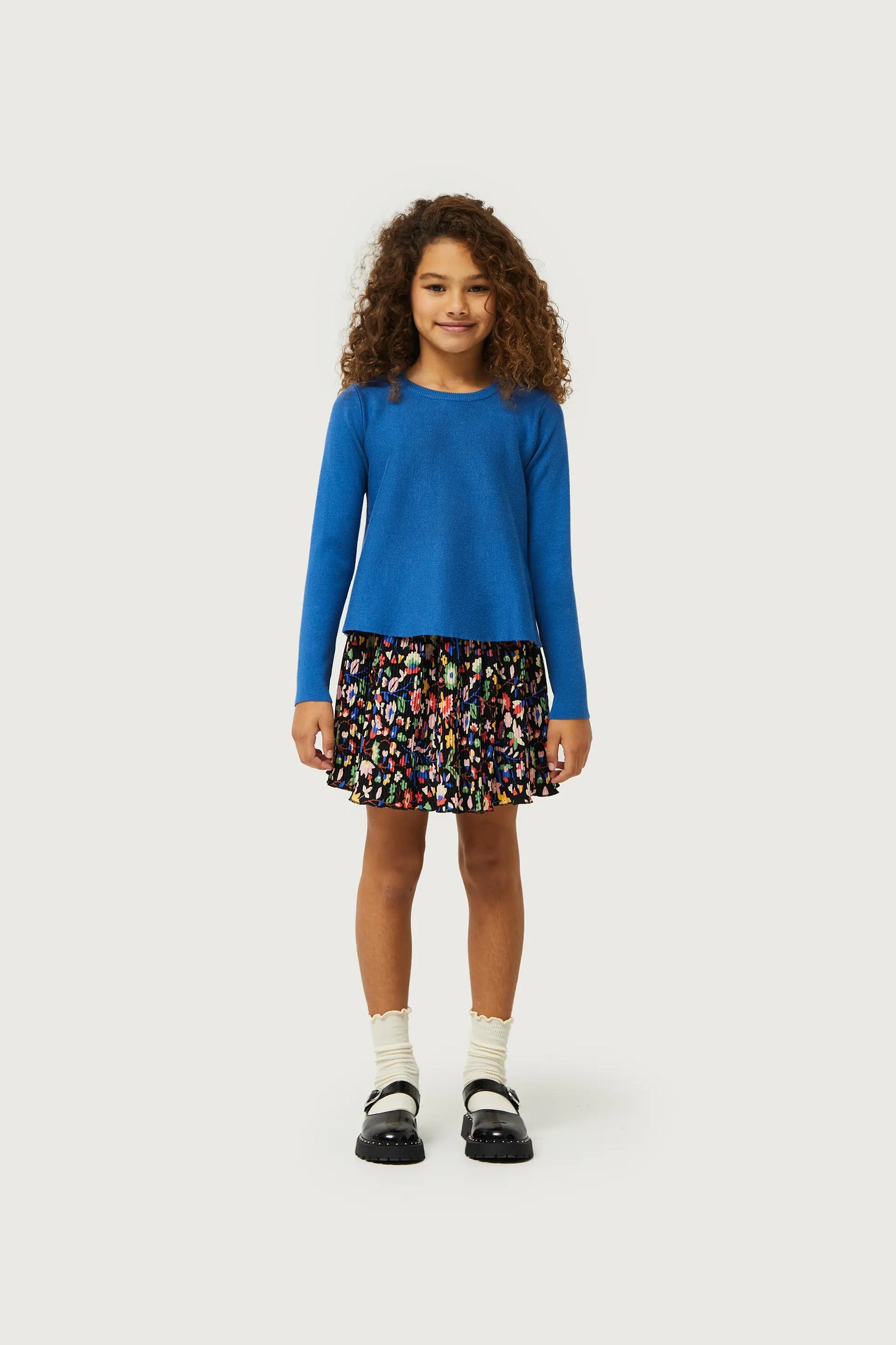 Girl's blue flared sweater