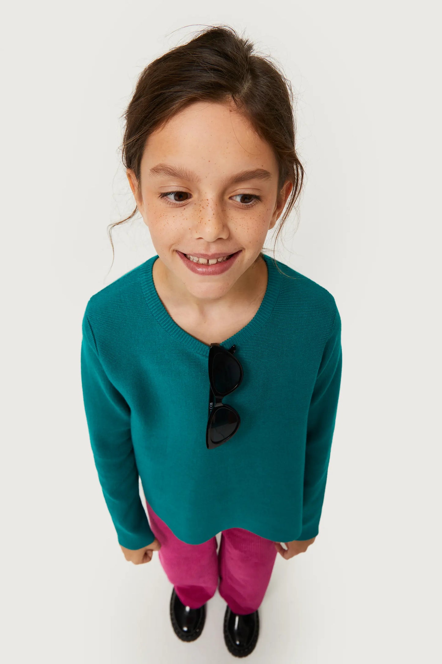 Maglia svasata verde da bambina