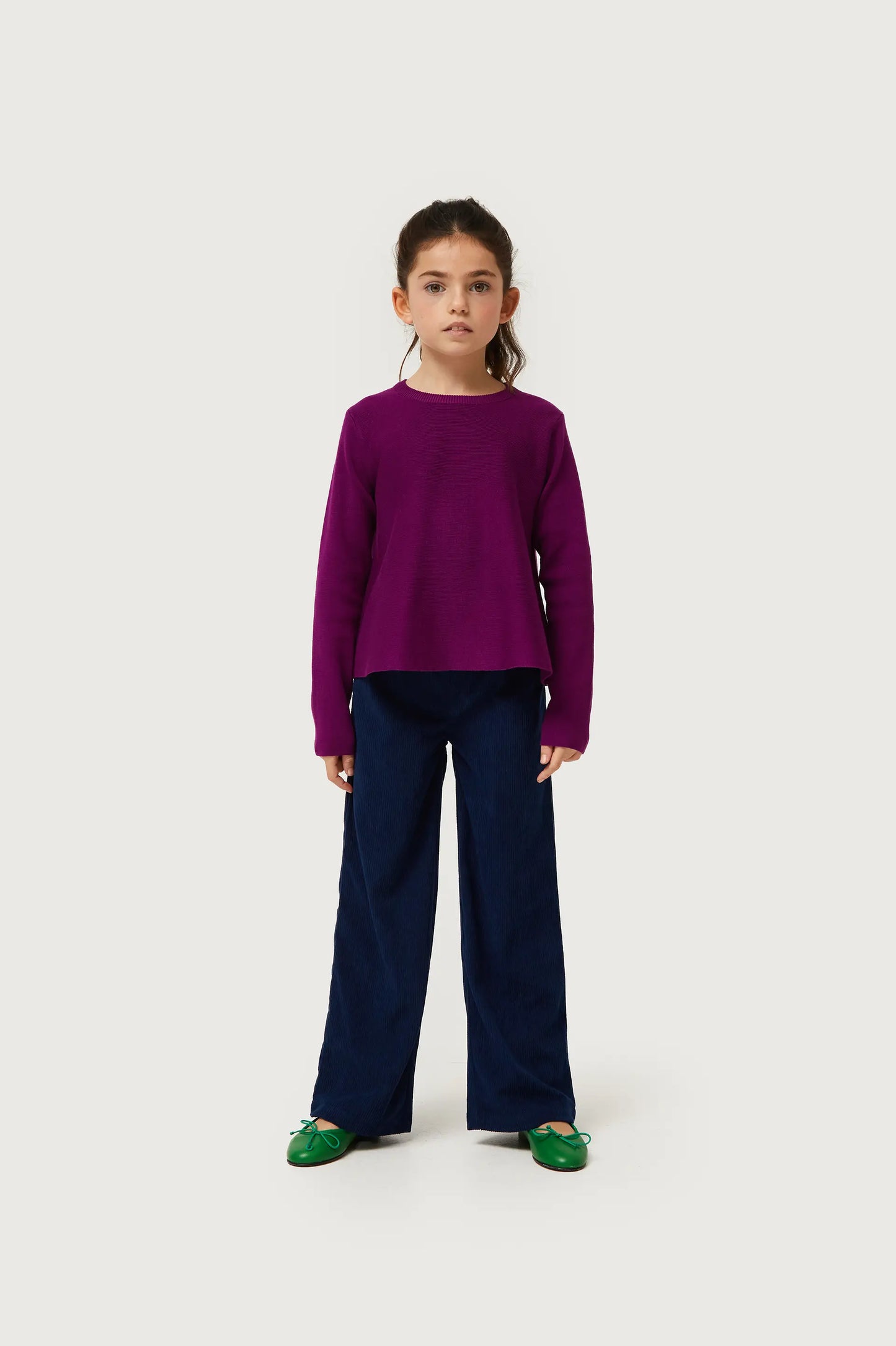 Girl's purple flared sweater