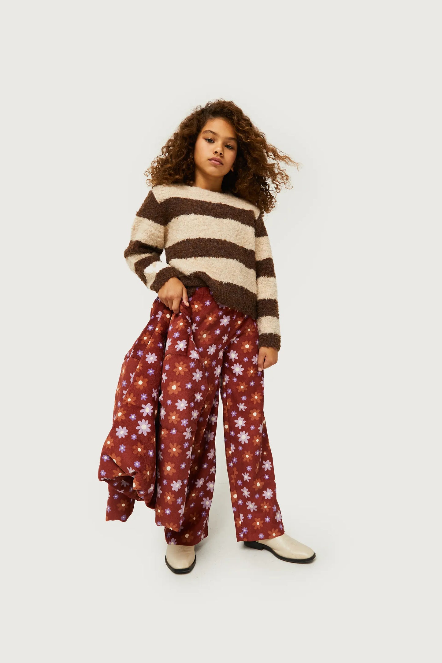 Girl's brown striped sweater