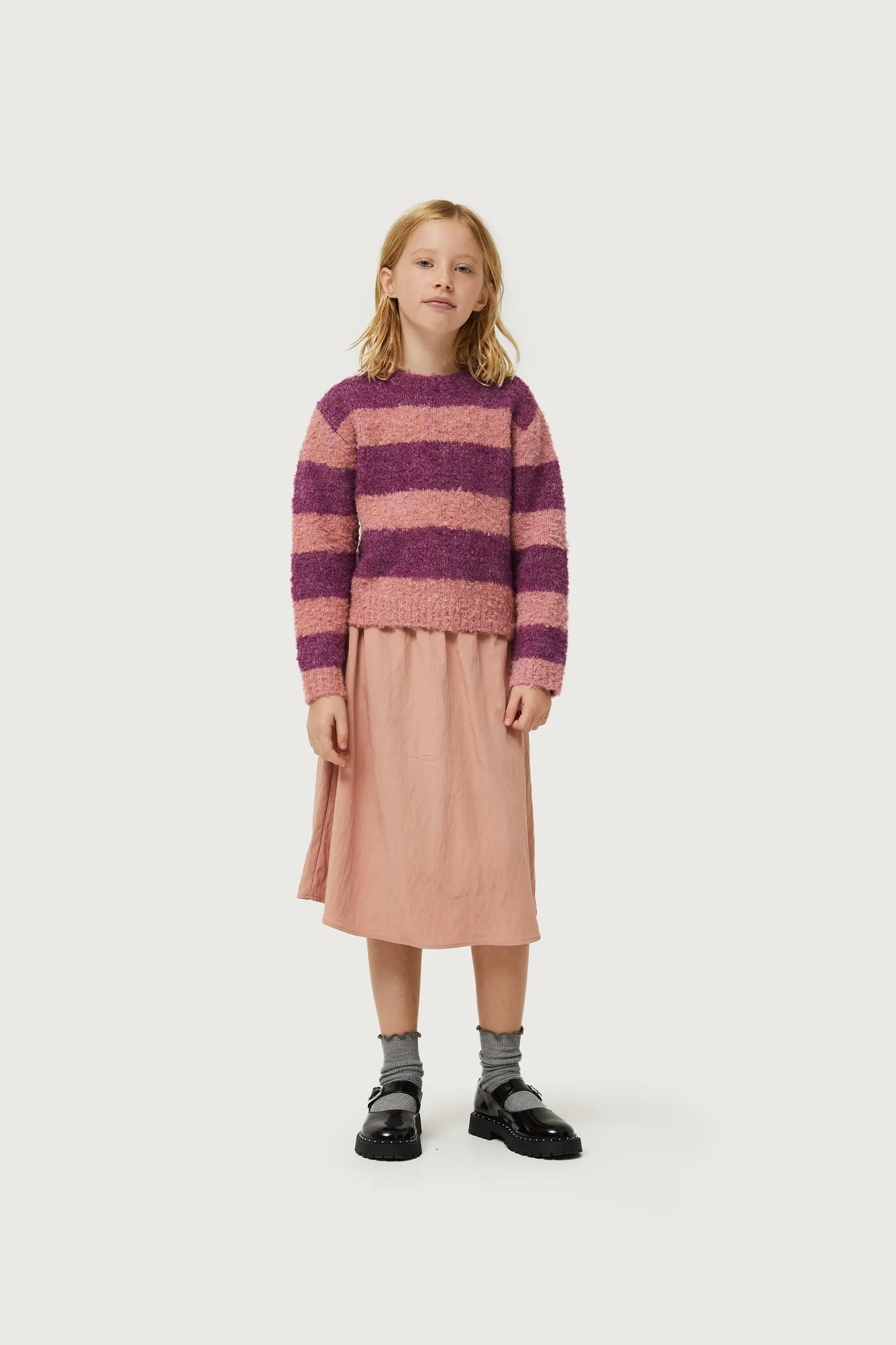 Girl's purple striped sweater