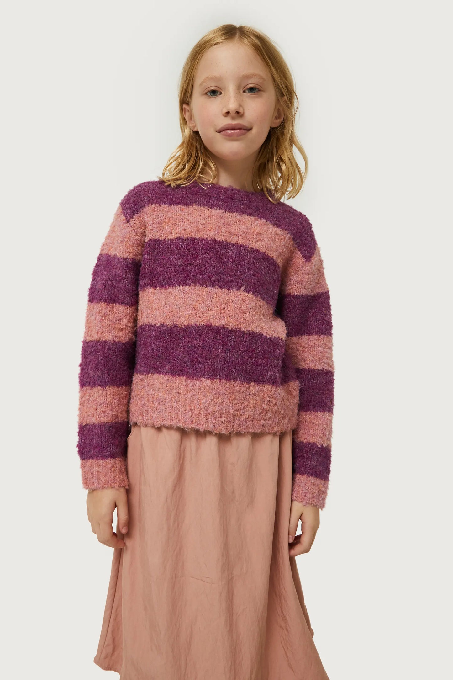 Girl's purple striped sweater