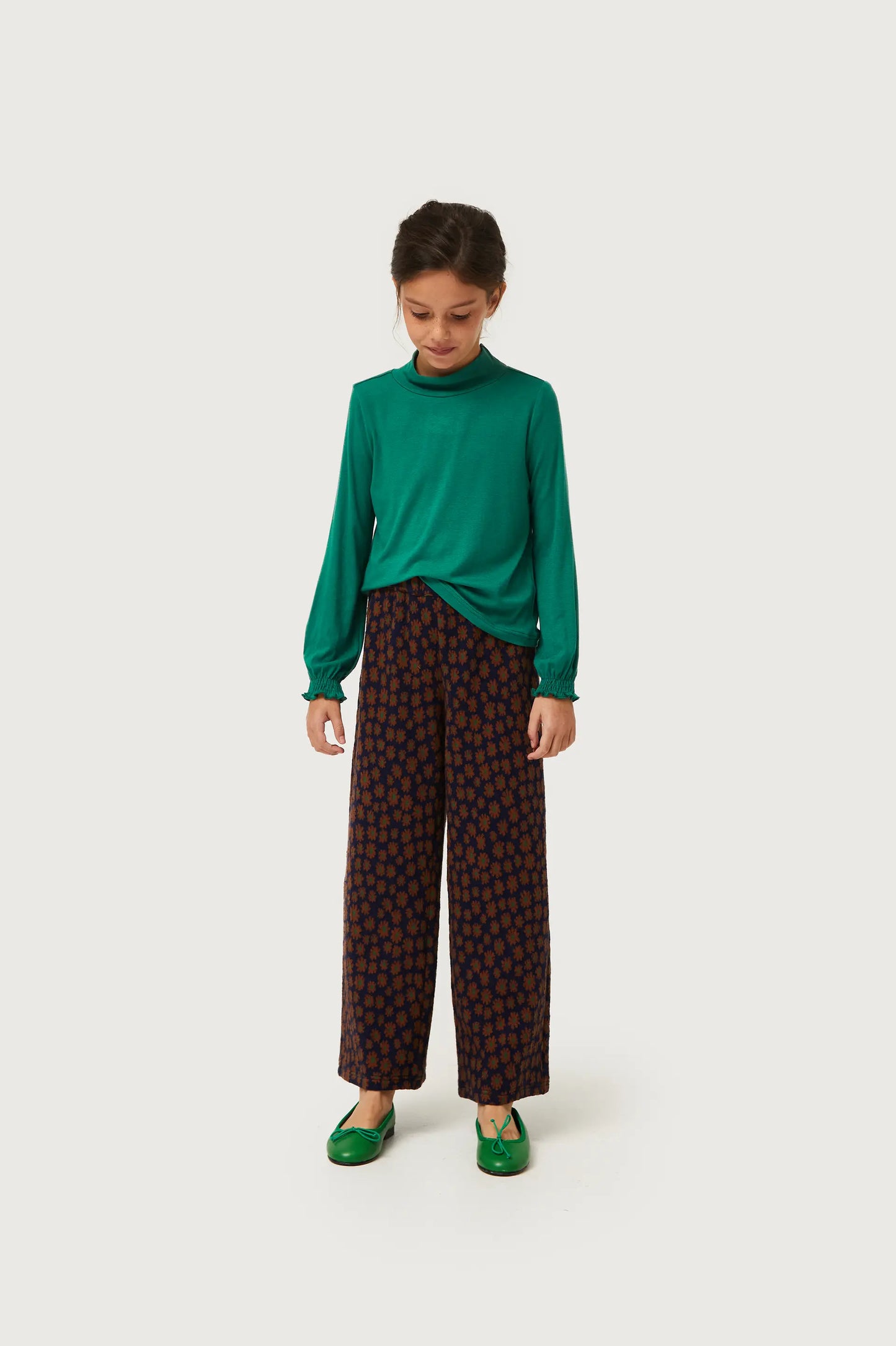 Girl's green turtleneck top