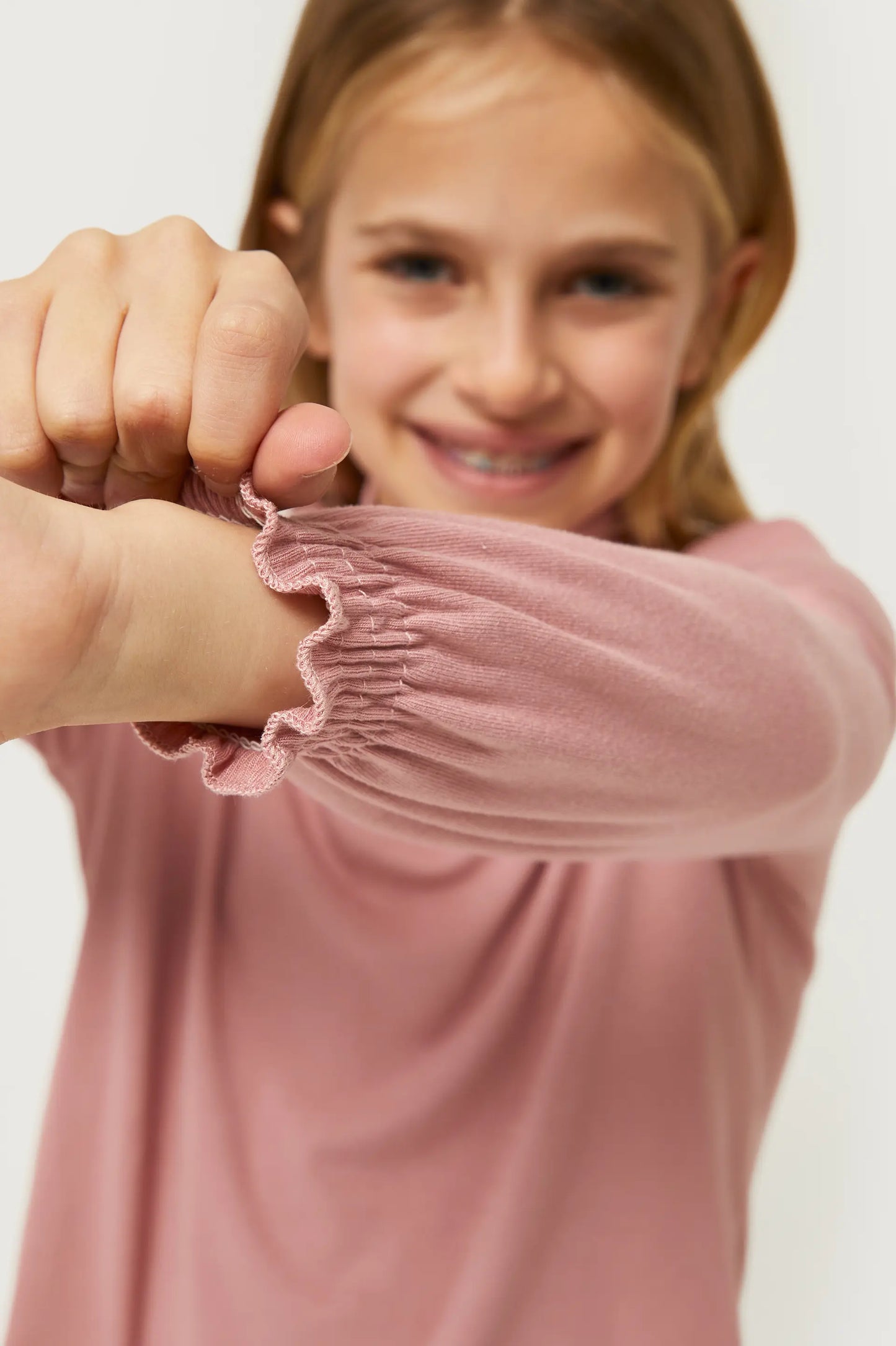 Girl's pink high-neck top