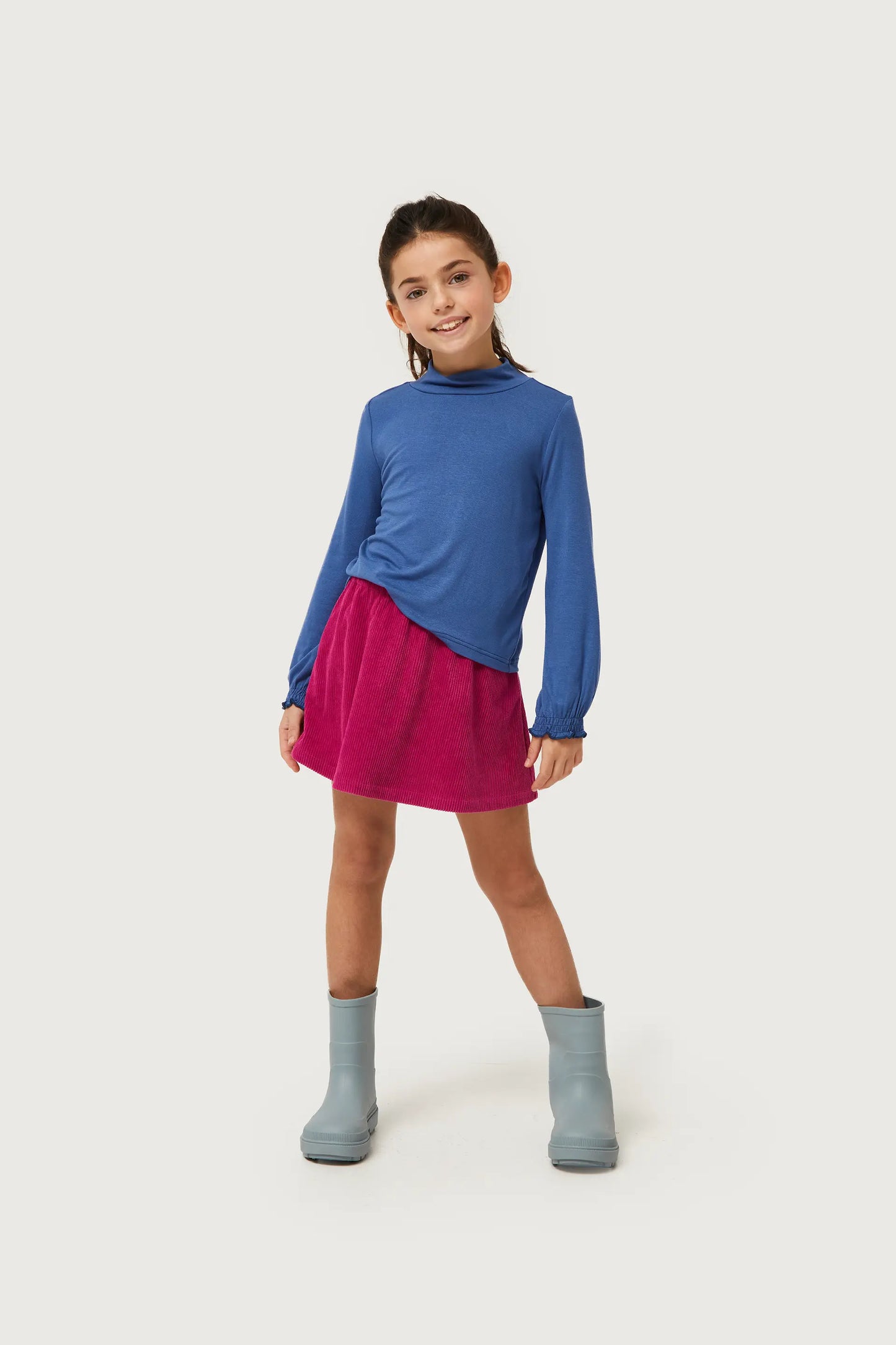 Girl's blue turtleneck top