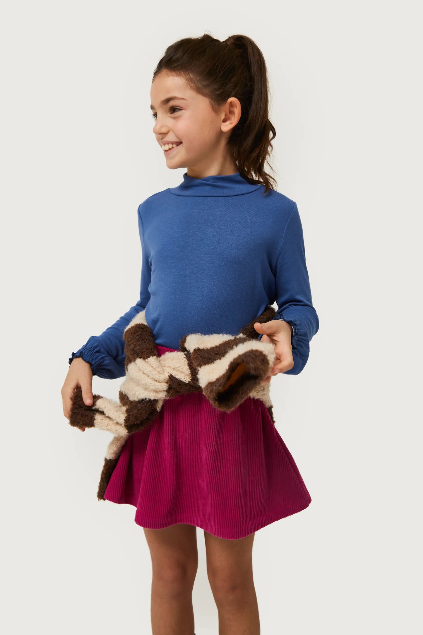 Girl's blue turtleneck top