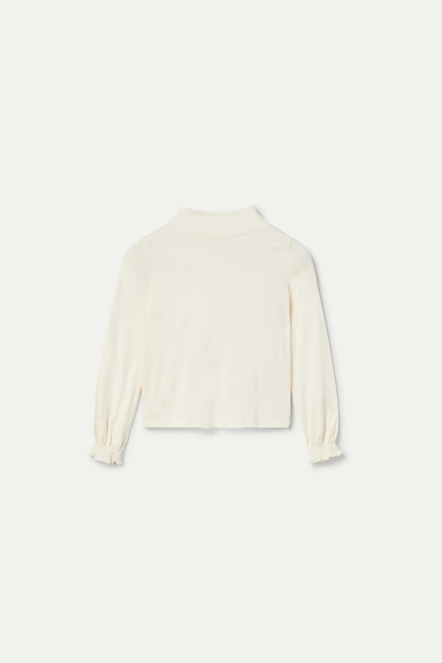 Girl's white turtleneck top