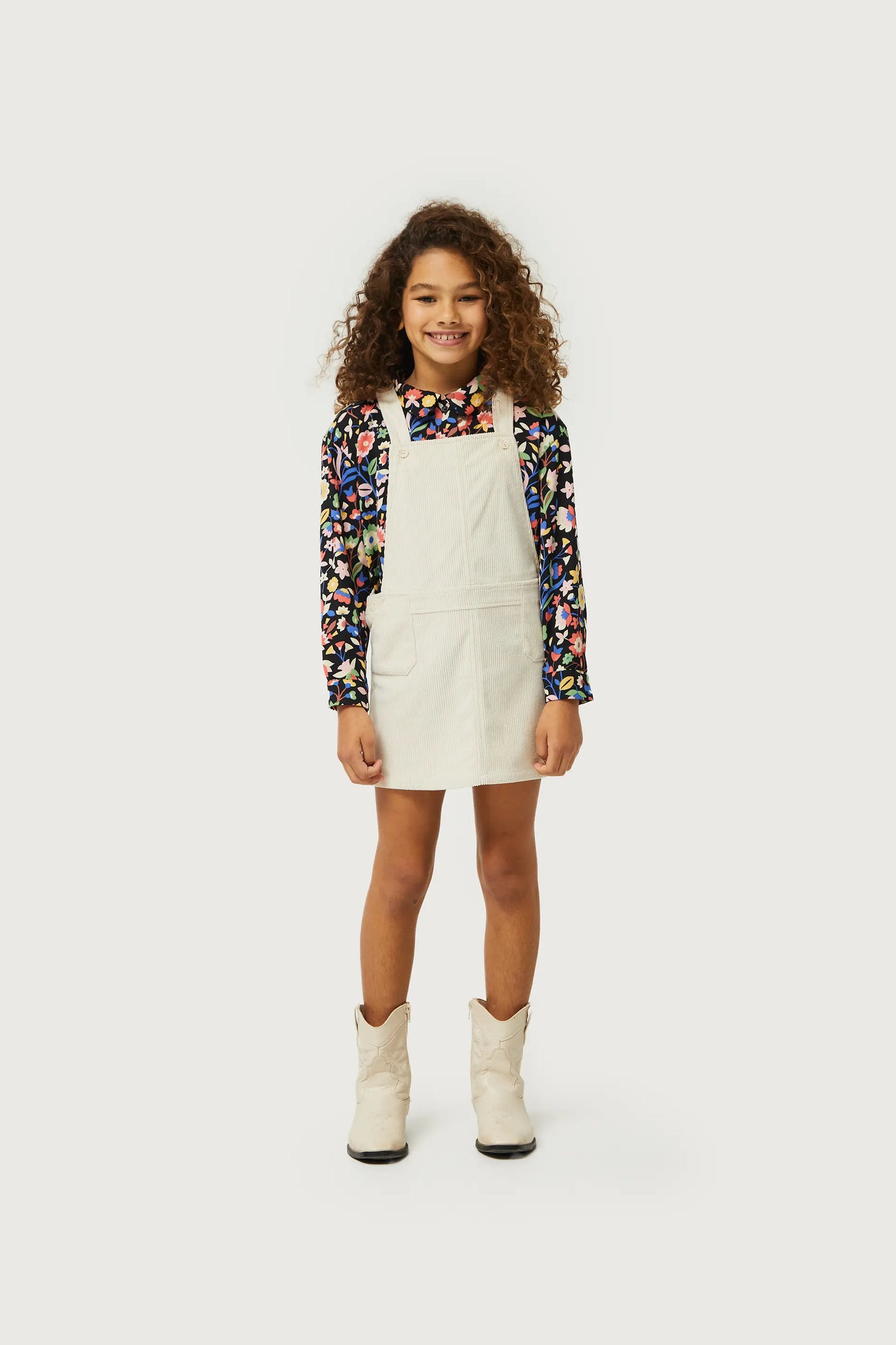 Girl's white corduroy pinafore