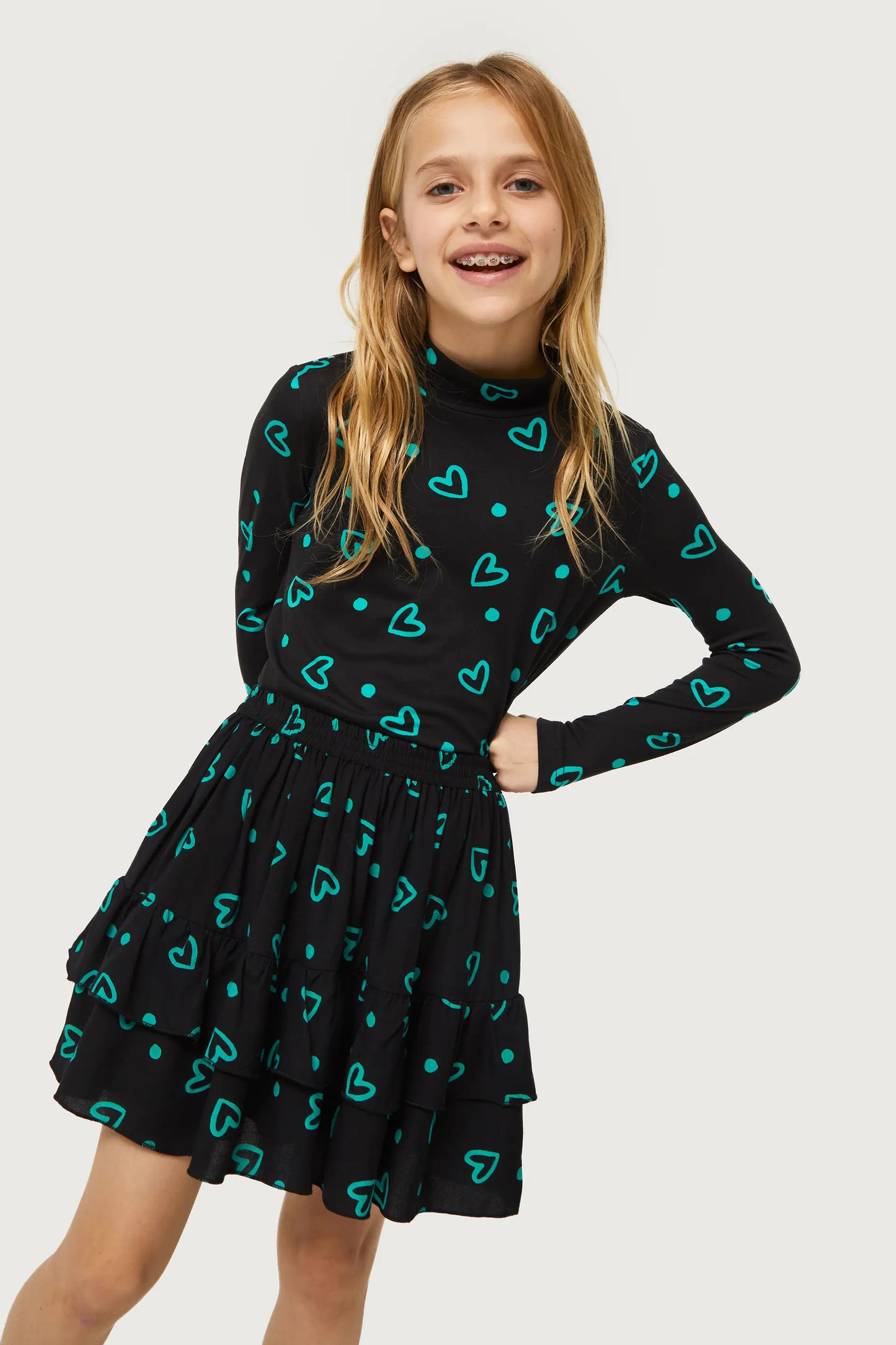 Girl's top with green heart print