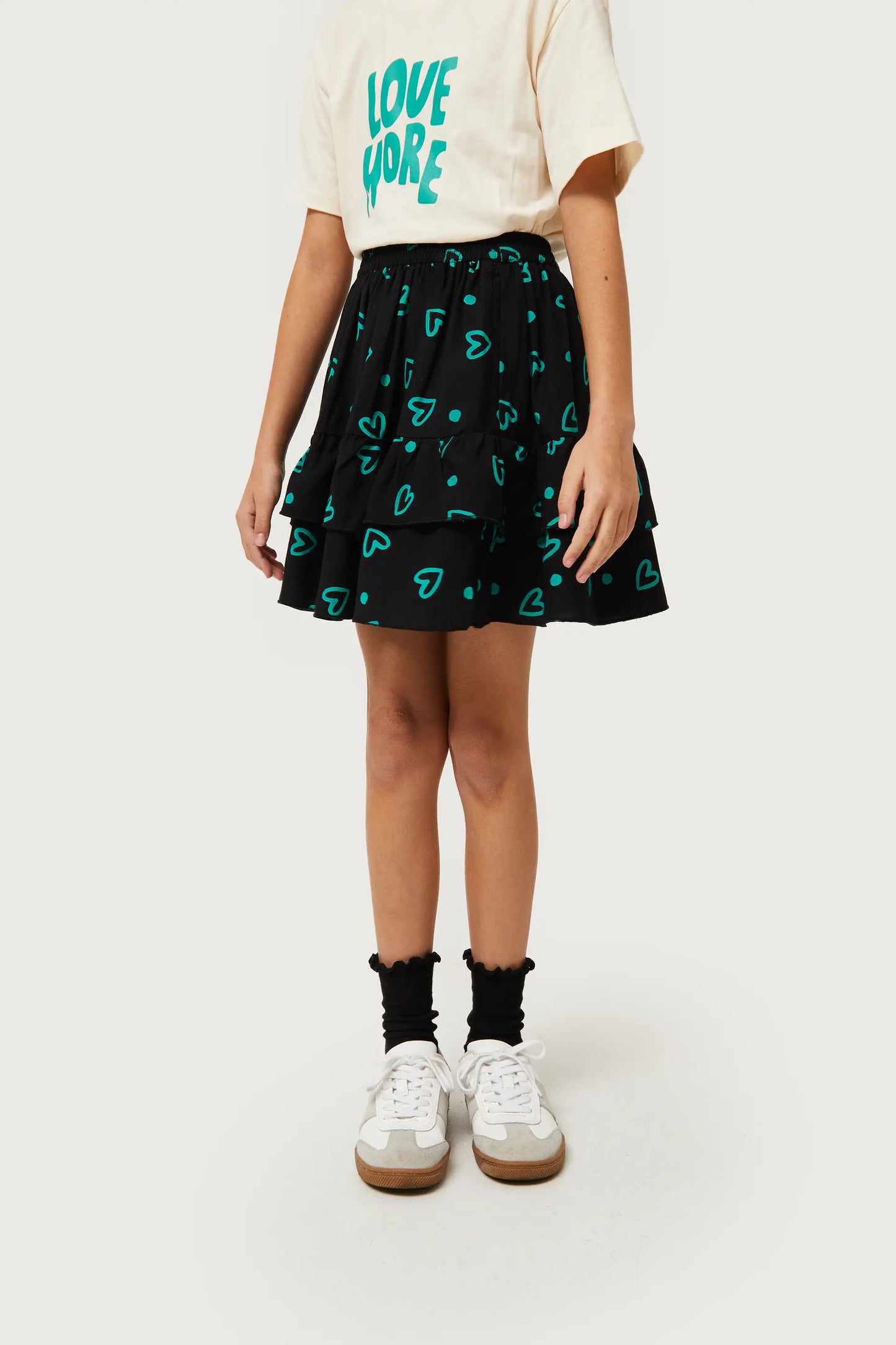 Girl's short skirt with green heart print