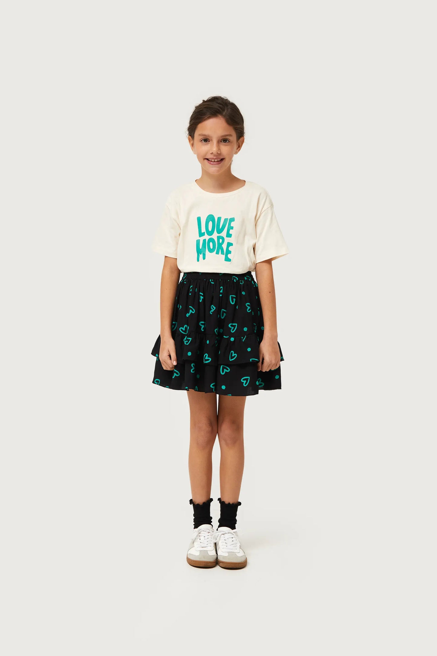 Girl's short skirt with green heart print