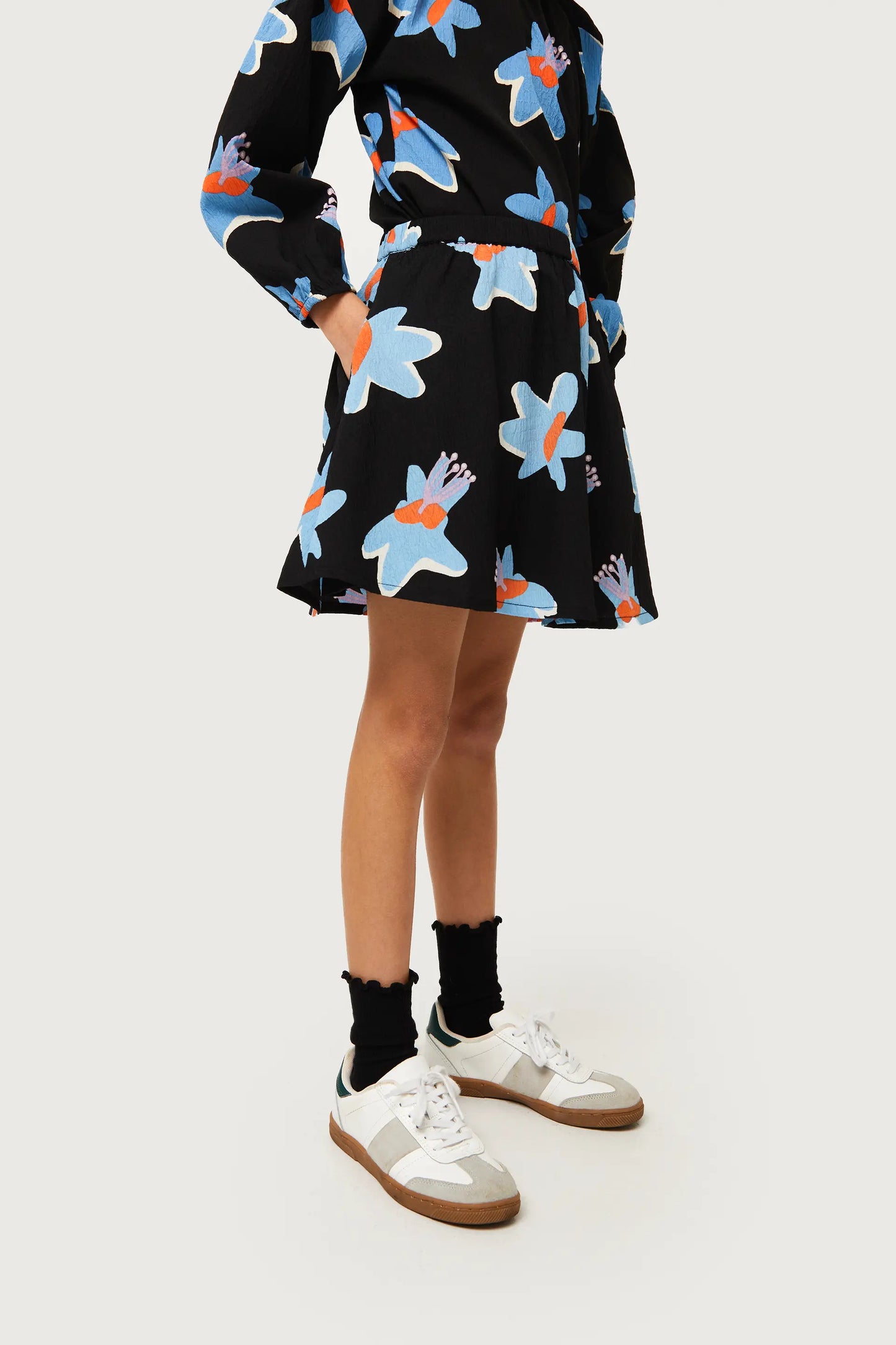 Calatea black floral print girl's short skirt