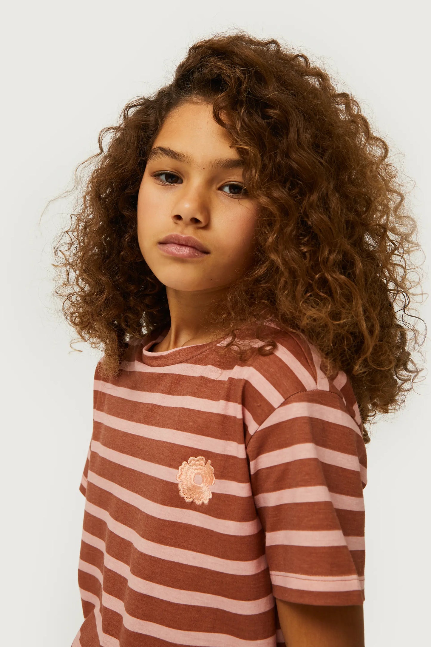 Girl's striped t-shirt with brown flower patch