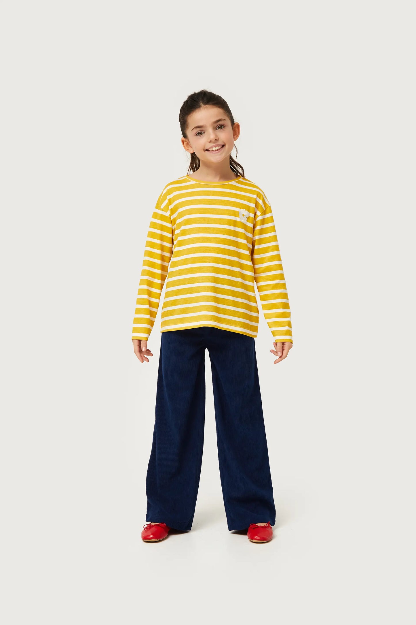 Girl's striped t-shirt with yellow flower patch