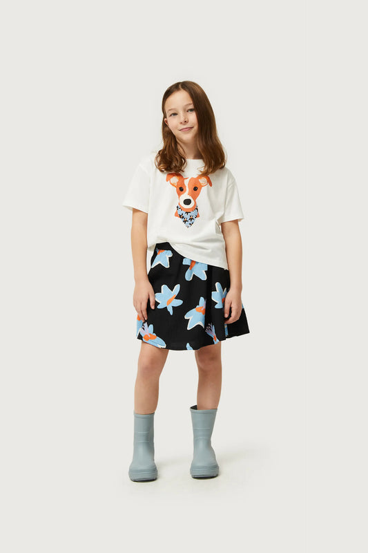 Camiseta de niña con print de perro estampado floral Calatea azul