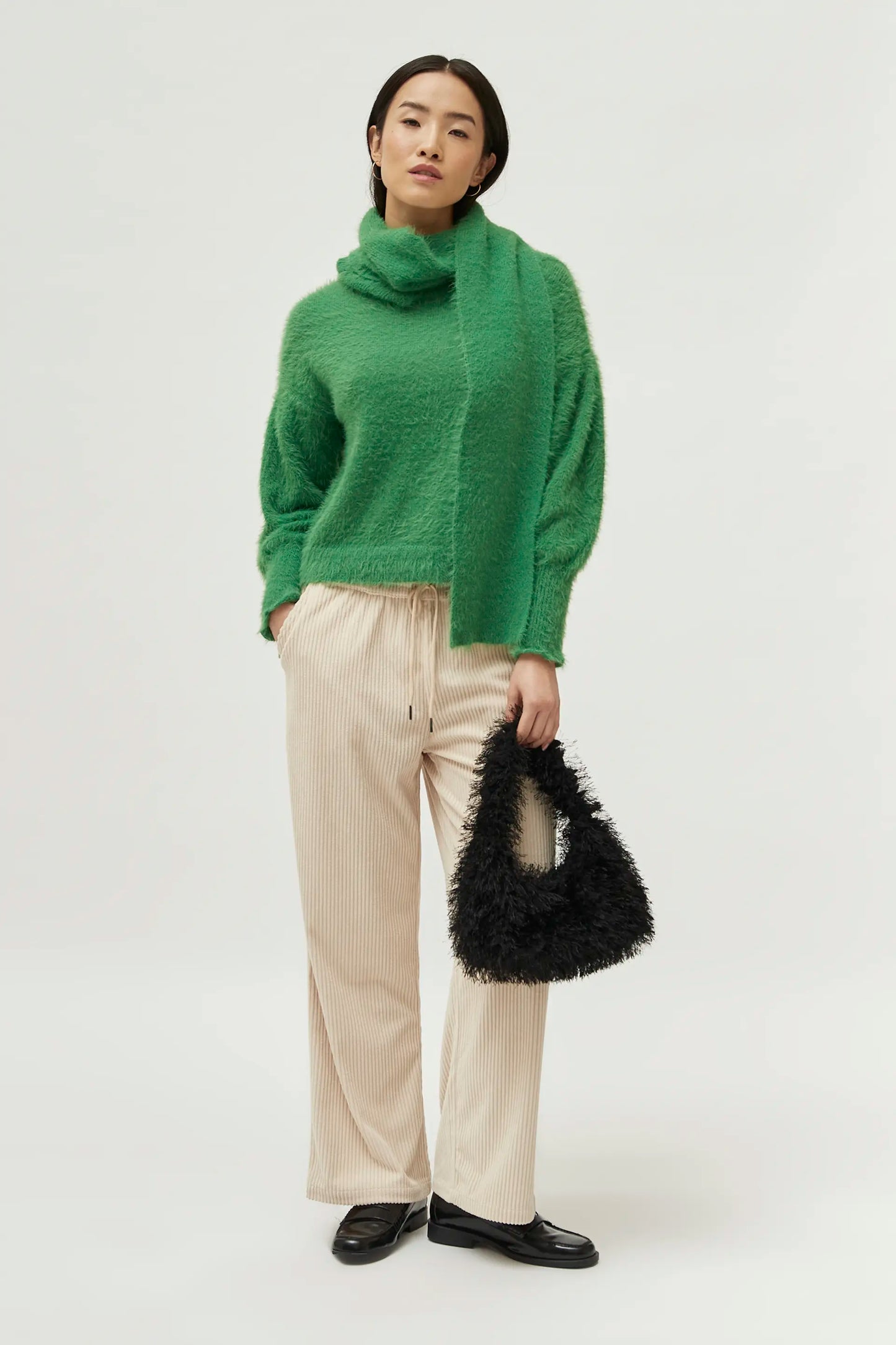 Green textured knit sweater