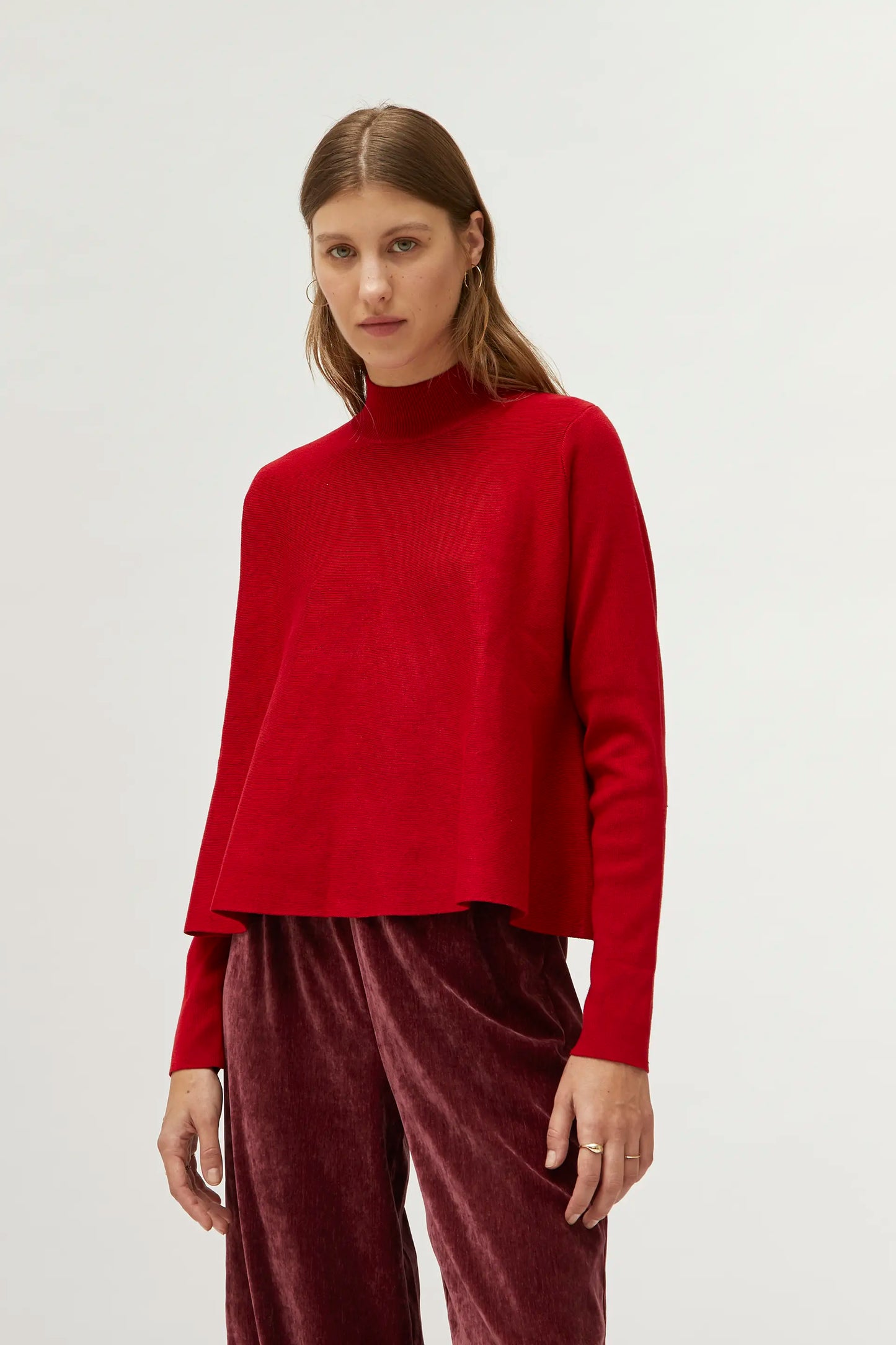 Red mock neck flared sweater