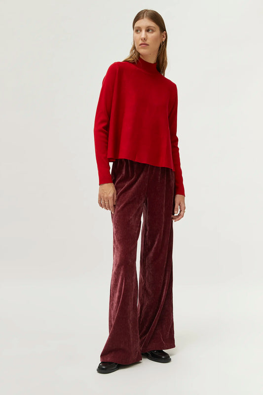 Red mock neck flared sweater