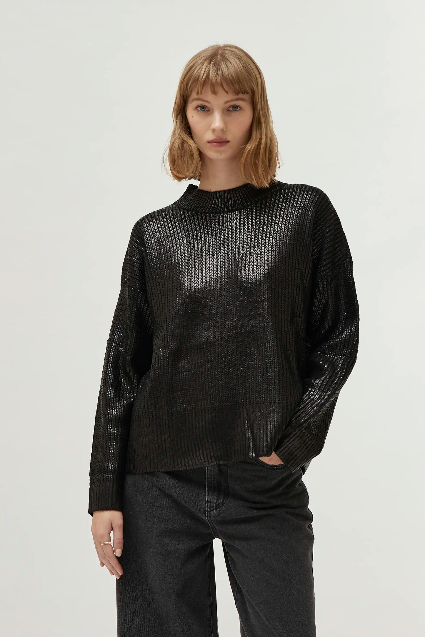 Black coated knit sweater