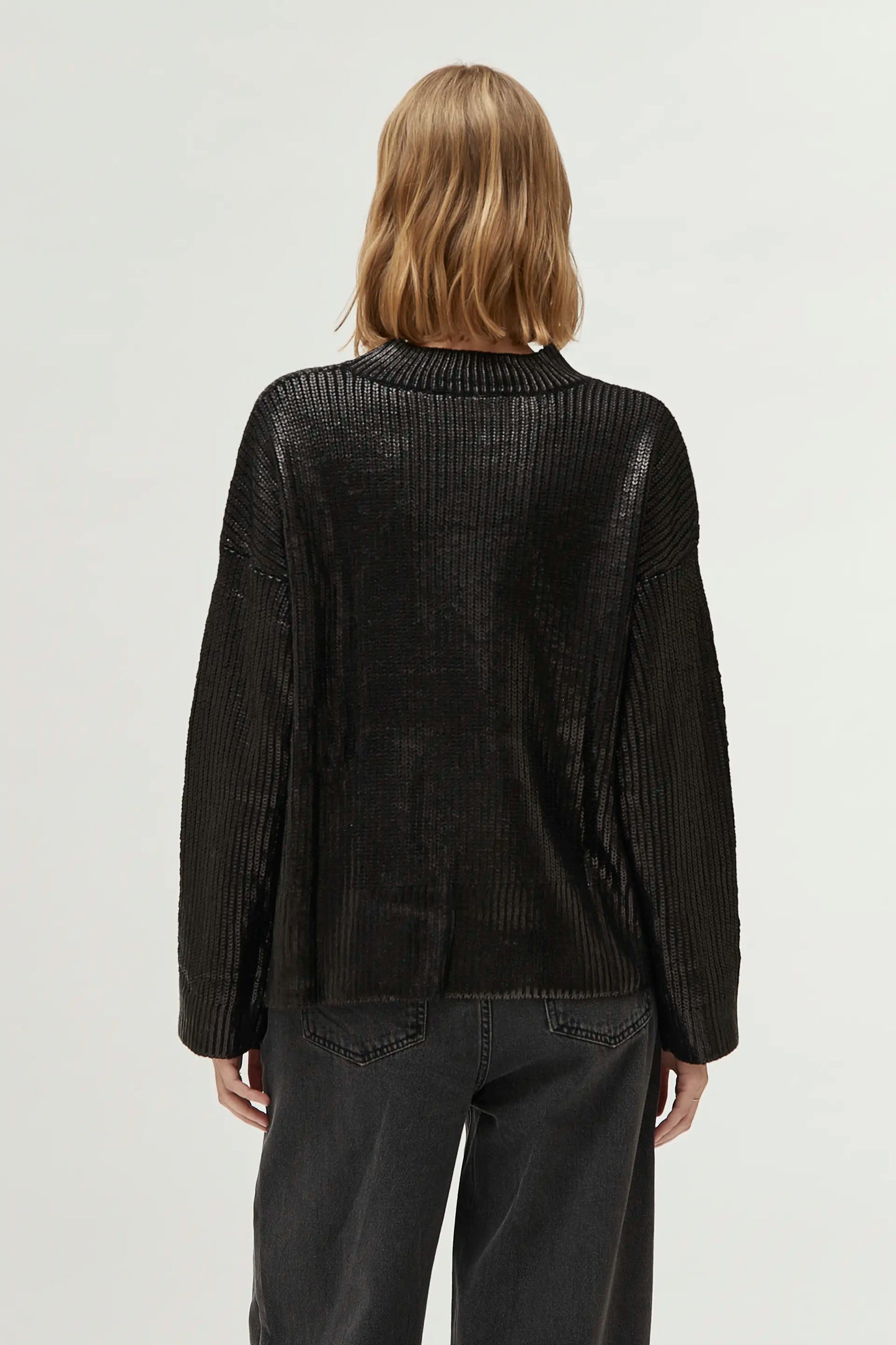 Black coated knit sweater