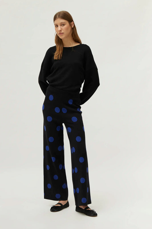 Pantaloni in maglia jacquard stampata a pois blu