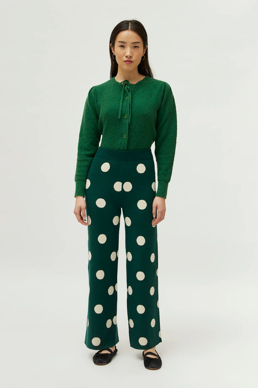 Pantaloni in maglia jacquard stampata a pois bianchi