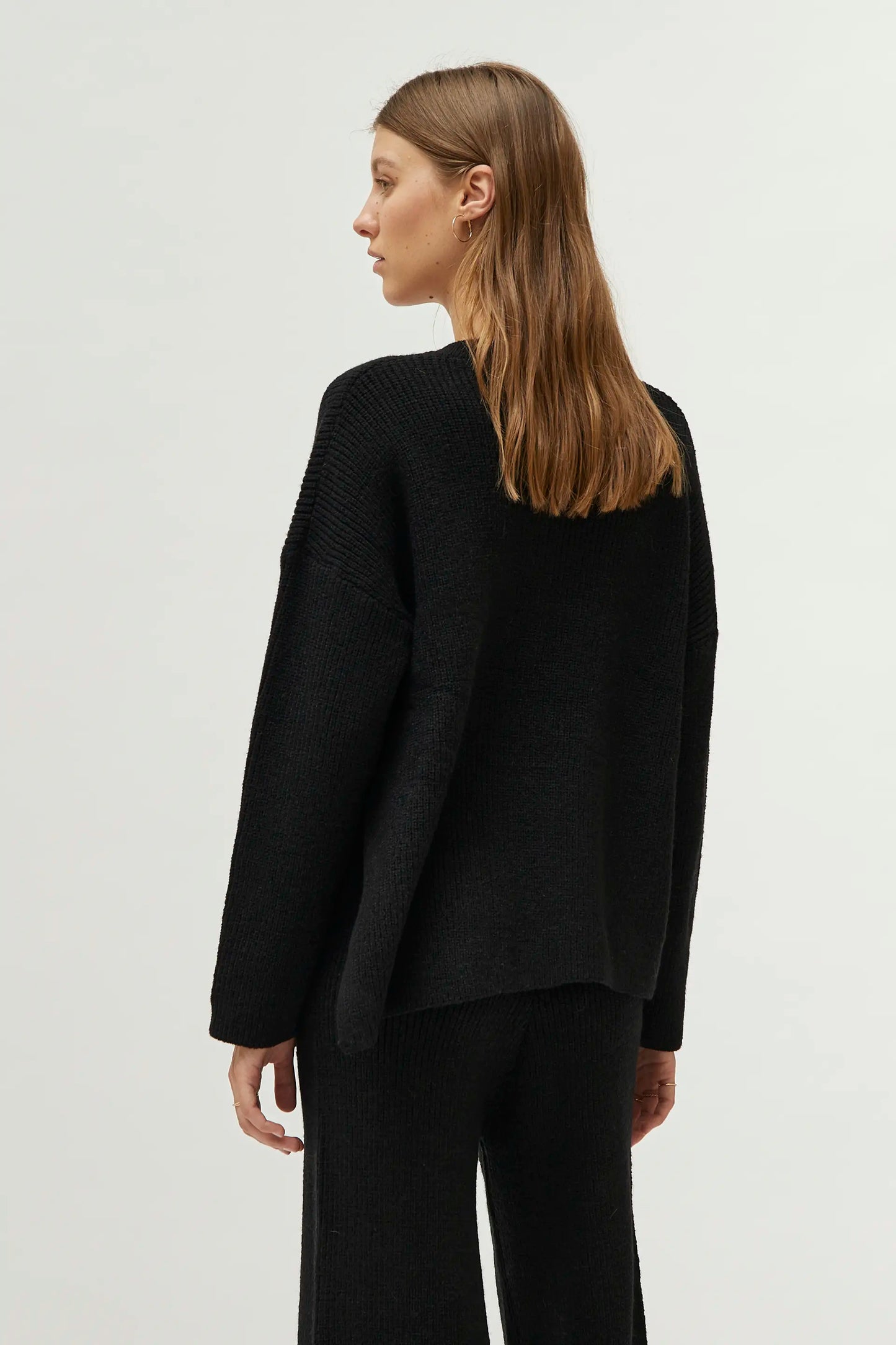 Black V-neck sweater