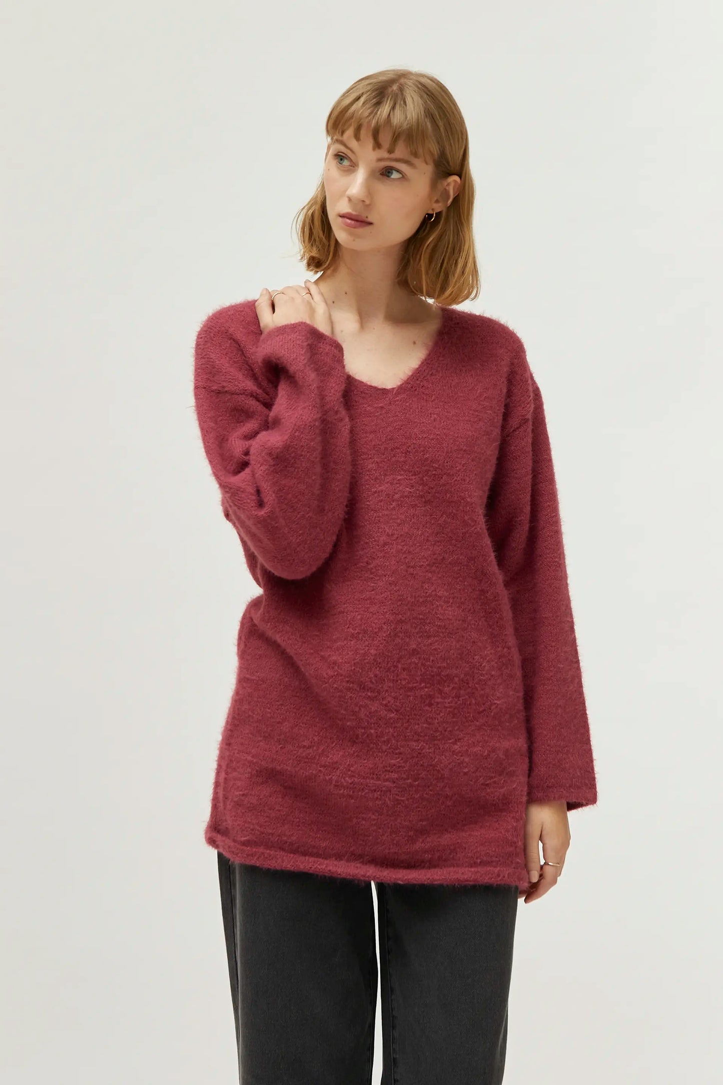 Long brown v-neck sweater