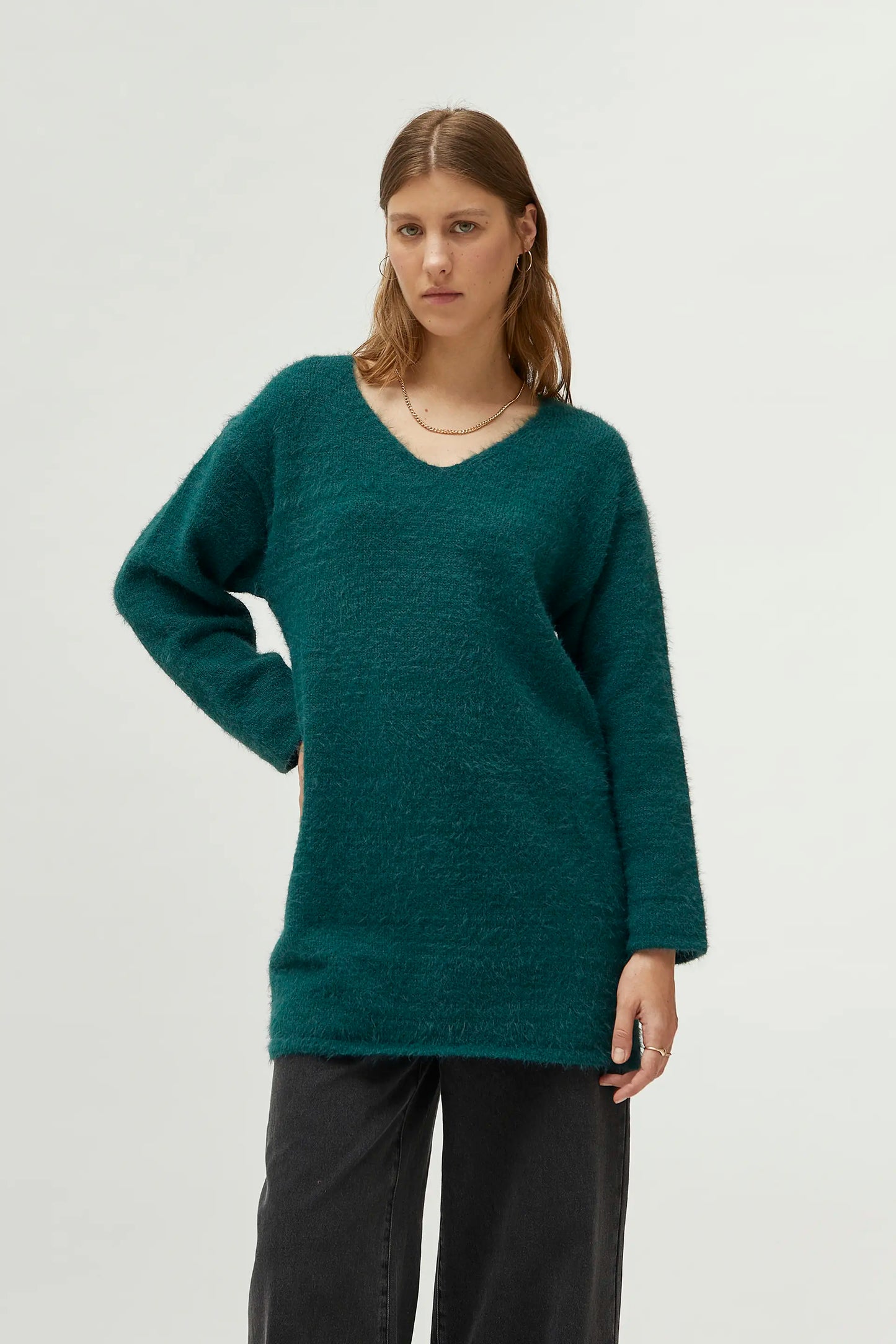 Long green v-neck sweater