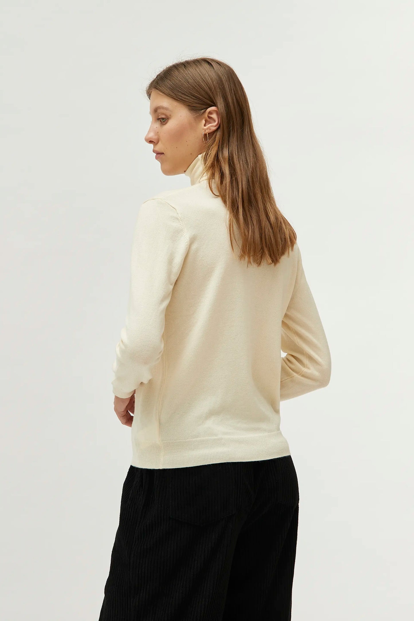 White turtleneck sweater