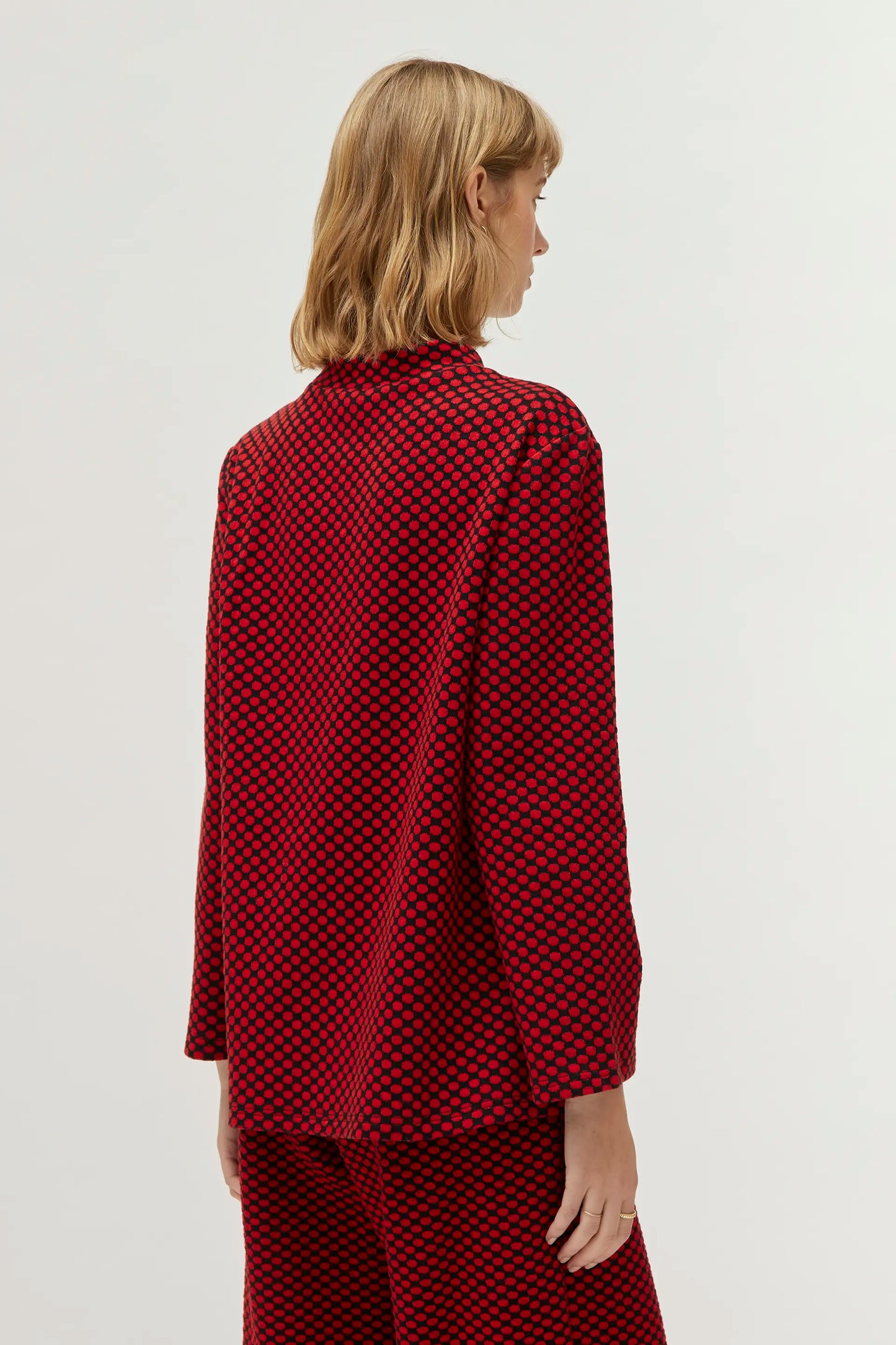 Top rosso in maglia stampata jacquard