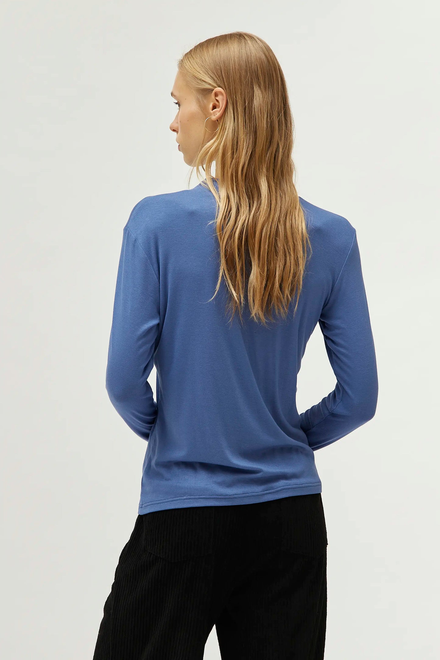 Blue mock neck top