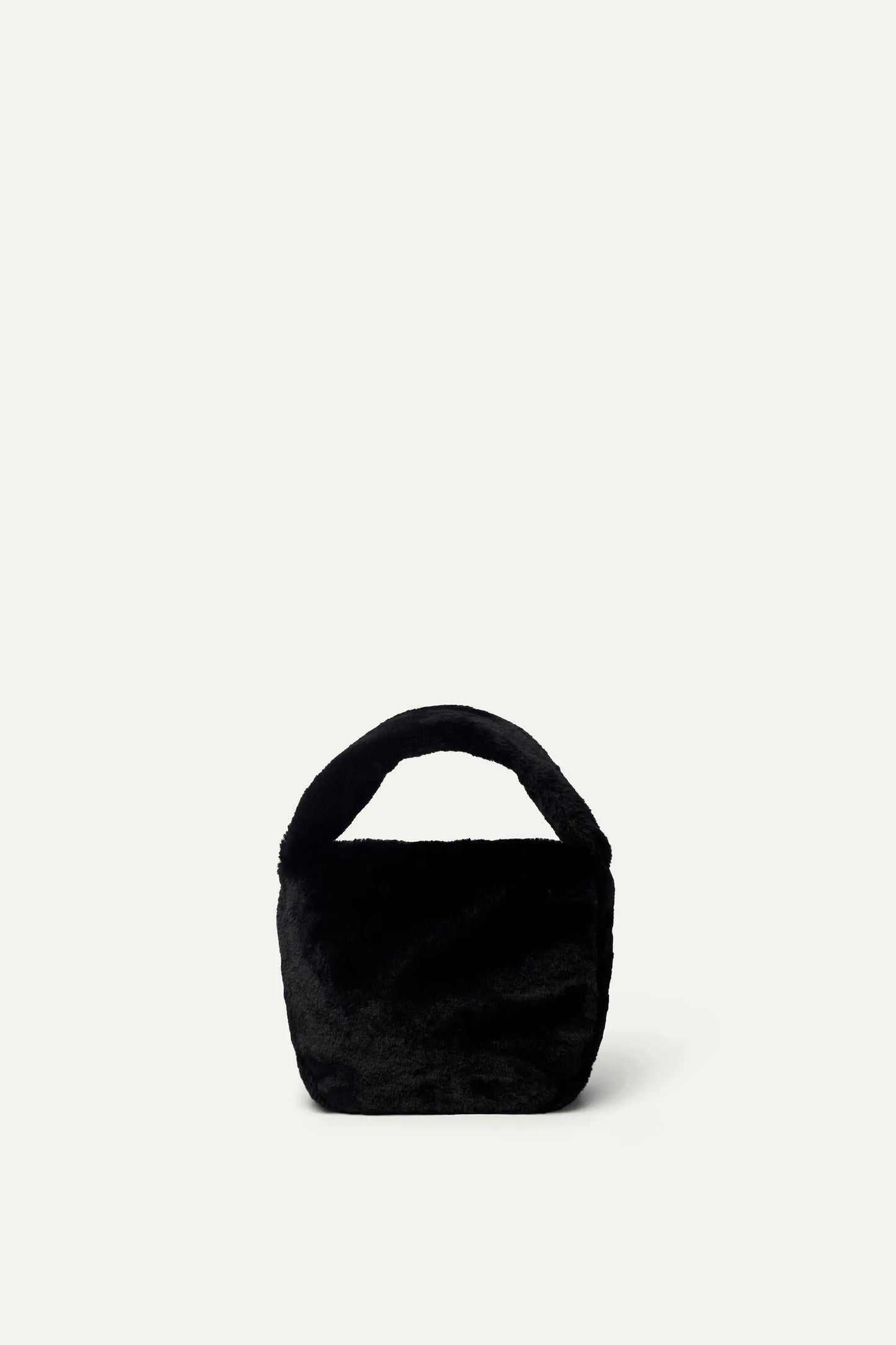 Black synthetic fur handbag