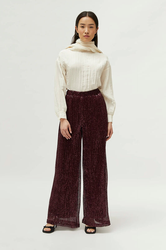 Pantaloni bordeaux con paillettes