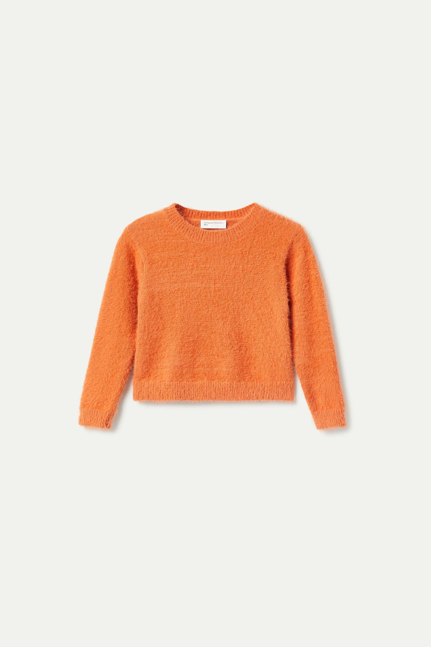 Girl's knitted sweater with orange texture