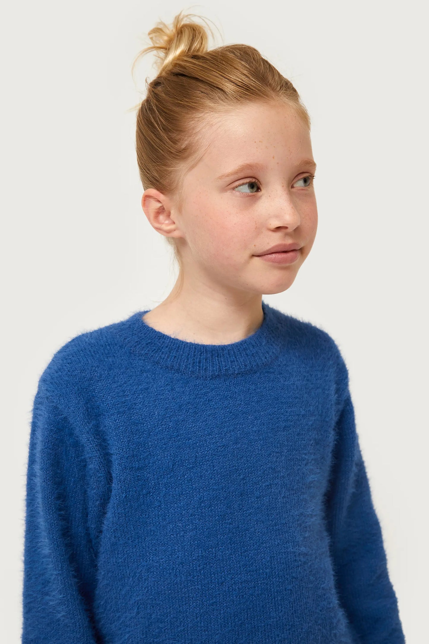 Girl's knitted sweater with blue texture