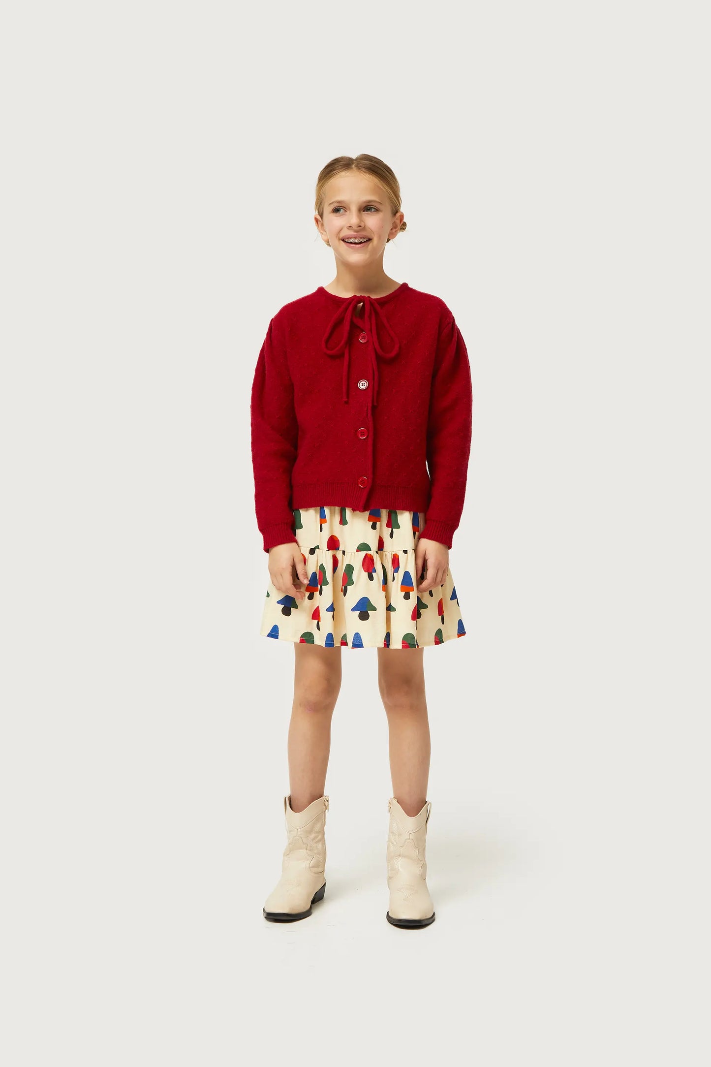 Girl's cardigan with red bow