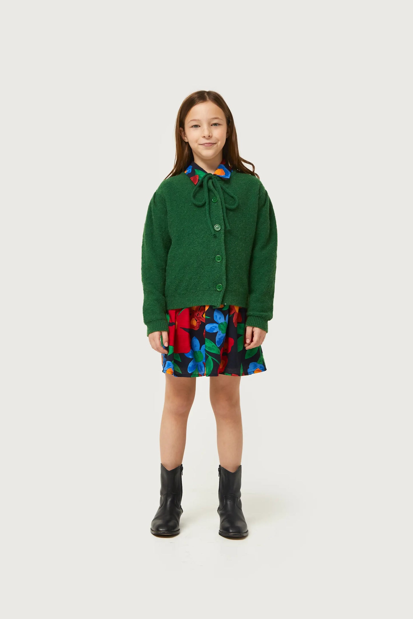 Girl's cardigan with green bow